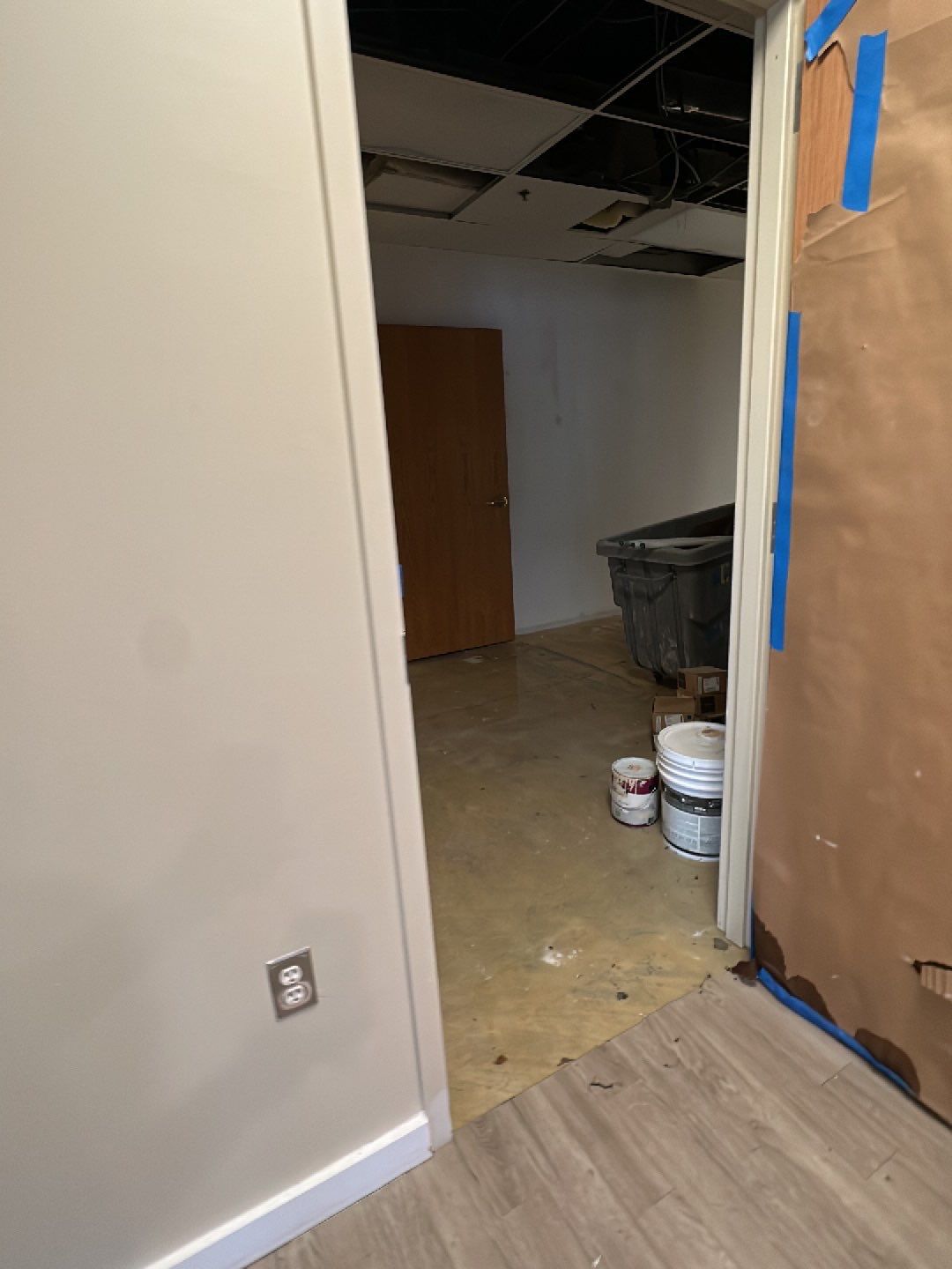 Continued dehumidification and air circulation during water damage restoration drying phase.