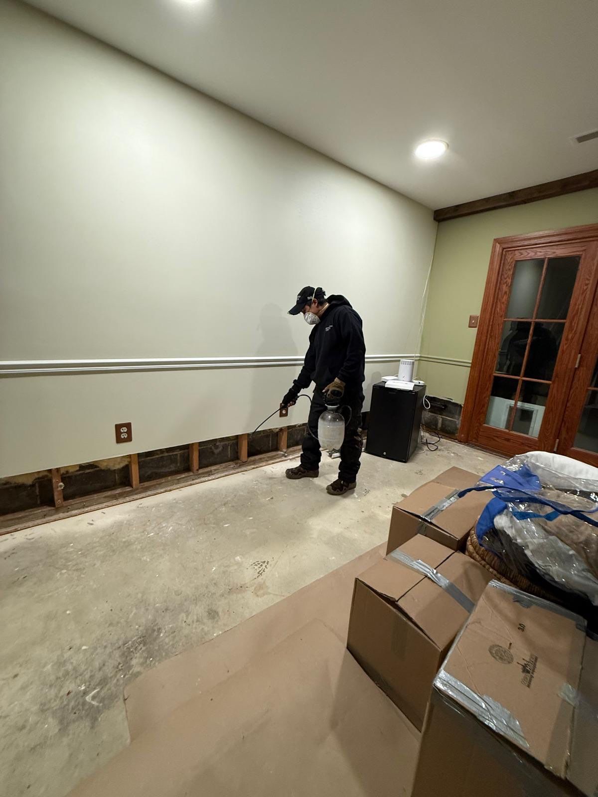 Completed drying and wall replacement in McLean water damage restoration, space ready for finishing.