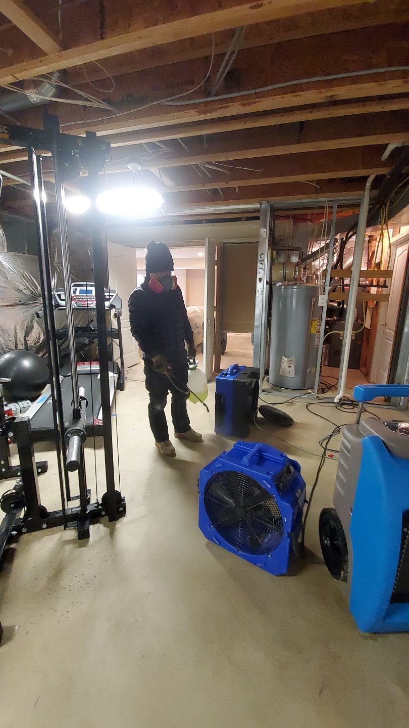 Baseboard removal and replacement underway as part of Leesburg water damage restoration.