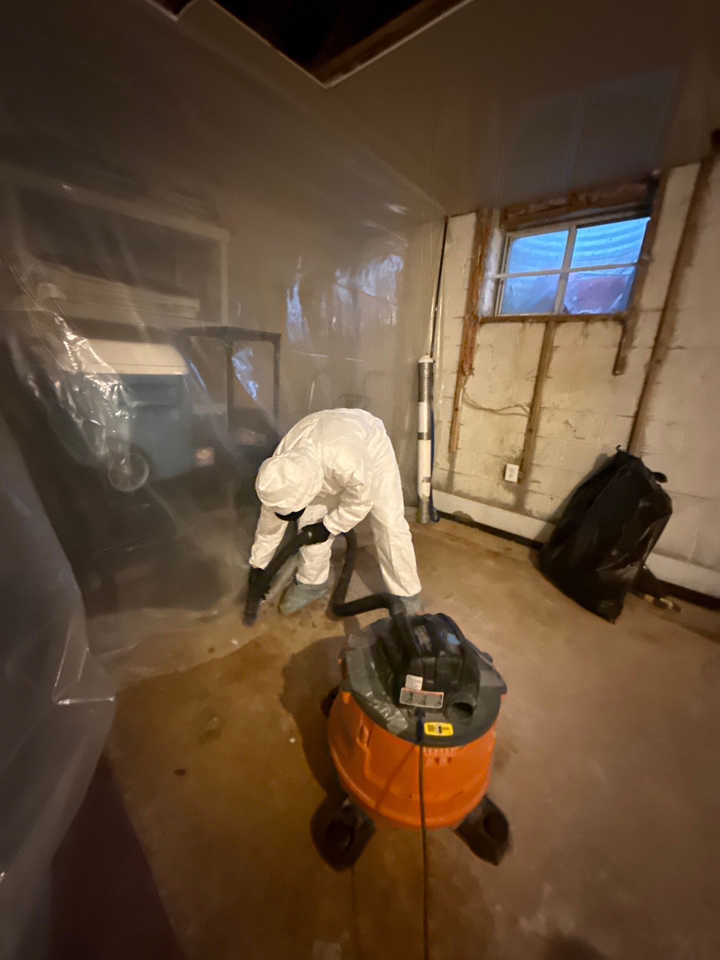 Containment barrier erected during mold remediation in Leesburg to isolate affected area.
