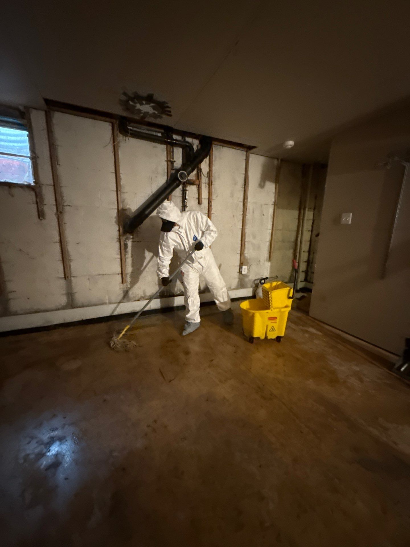 Structural drying equipment positioned to remove moisture from affected surfaces.