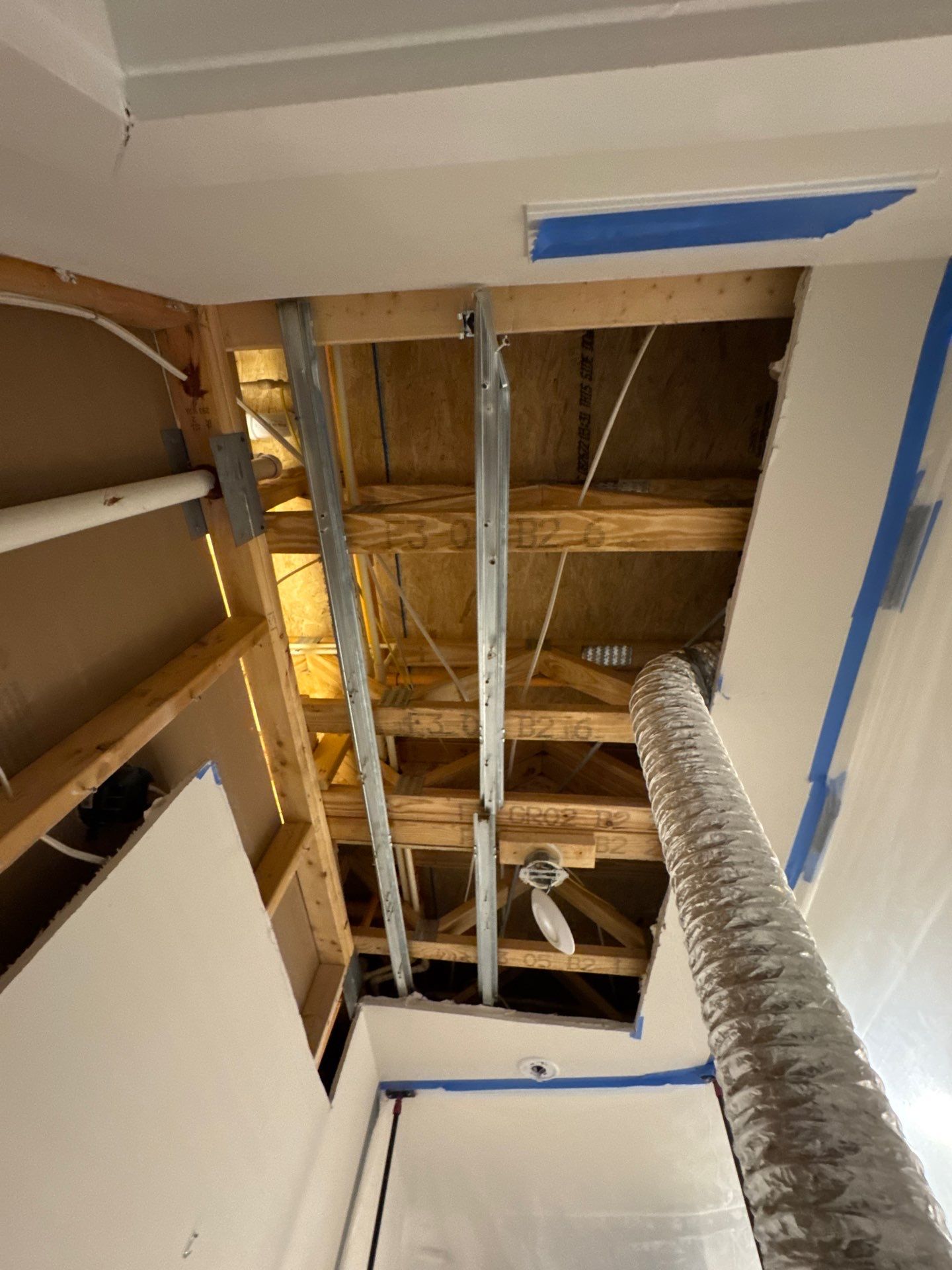 Containment barrier and negative air setup isolate the work zone during mold remediation in Reston.