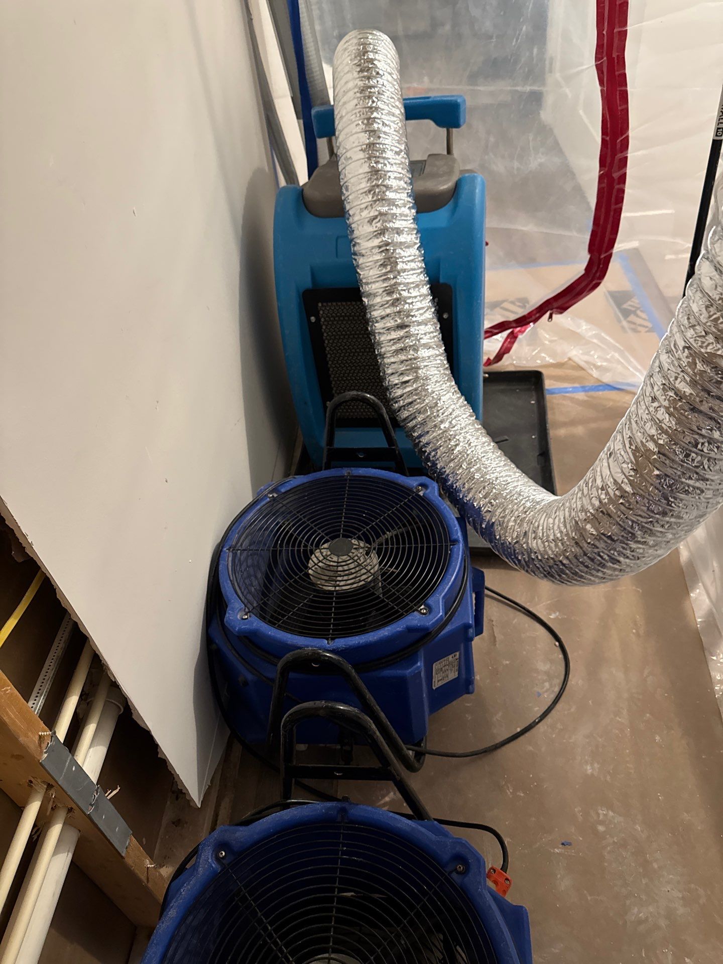 Antimicrobial application and sanitizing treatment applied to cleaned surfaces during Reston remediation work.