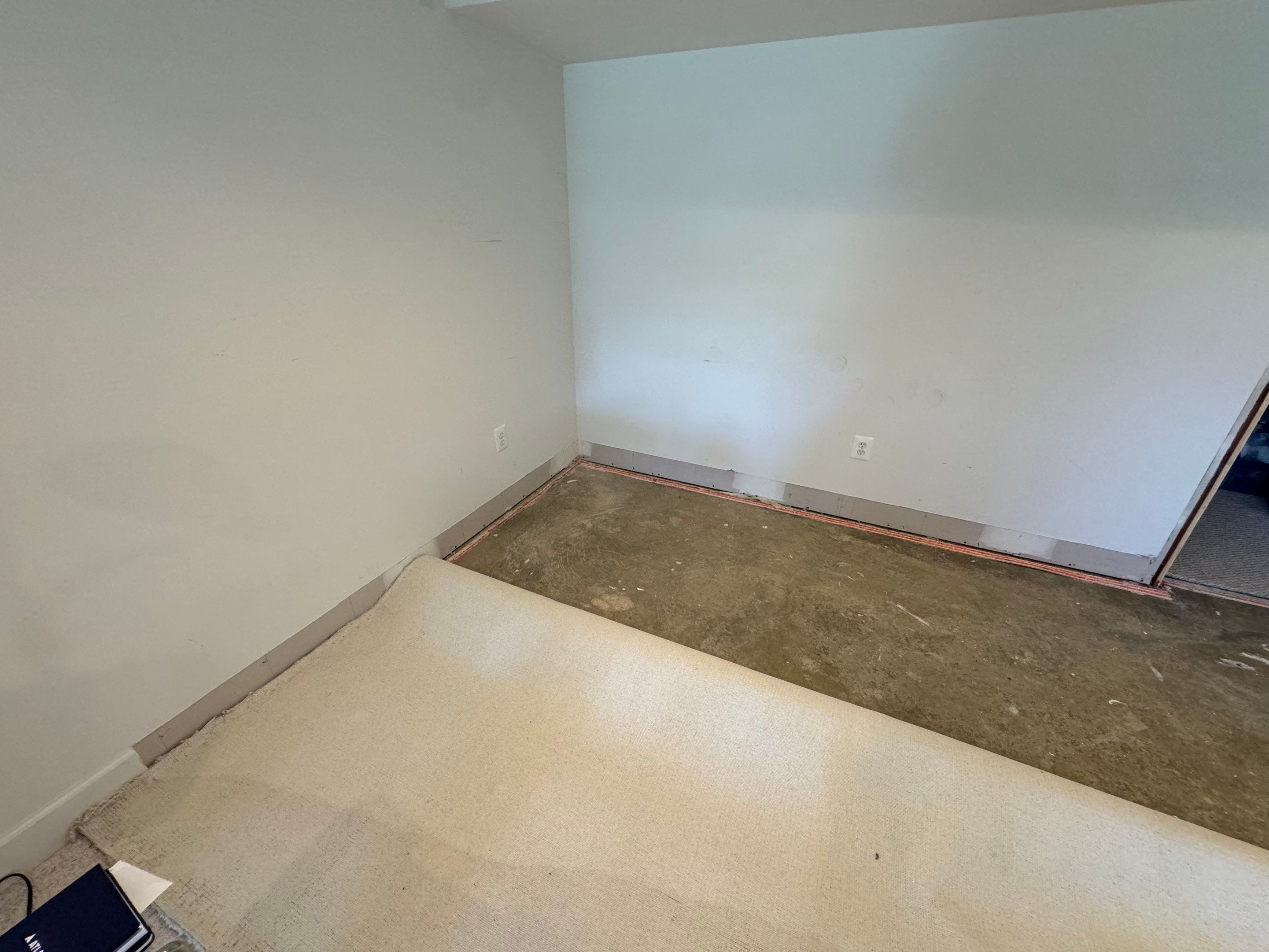 Continued dehumidification process with equipment monitoring structural moisture levels during water restoration.
