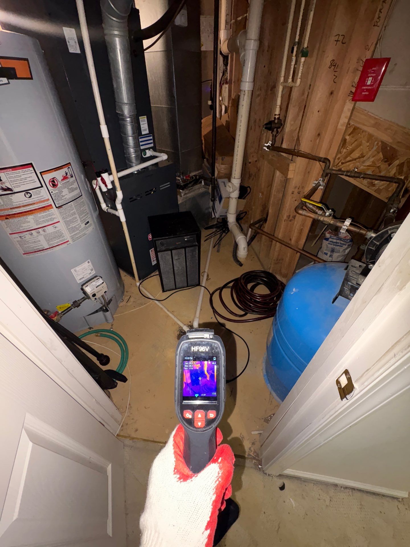 Contents being inventoried and protected as part of water damage mitigation workflow.