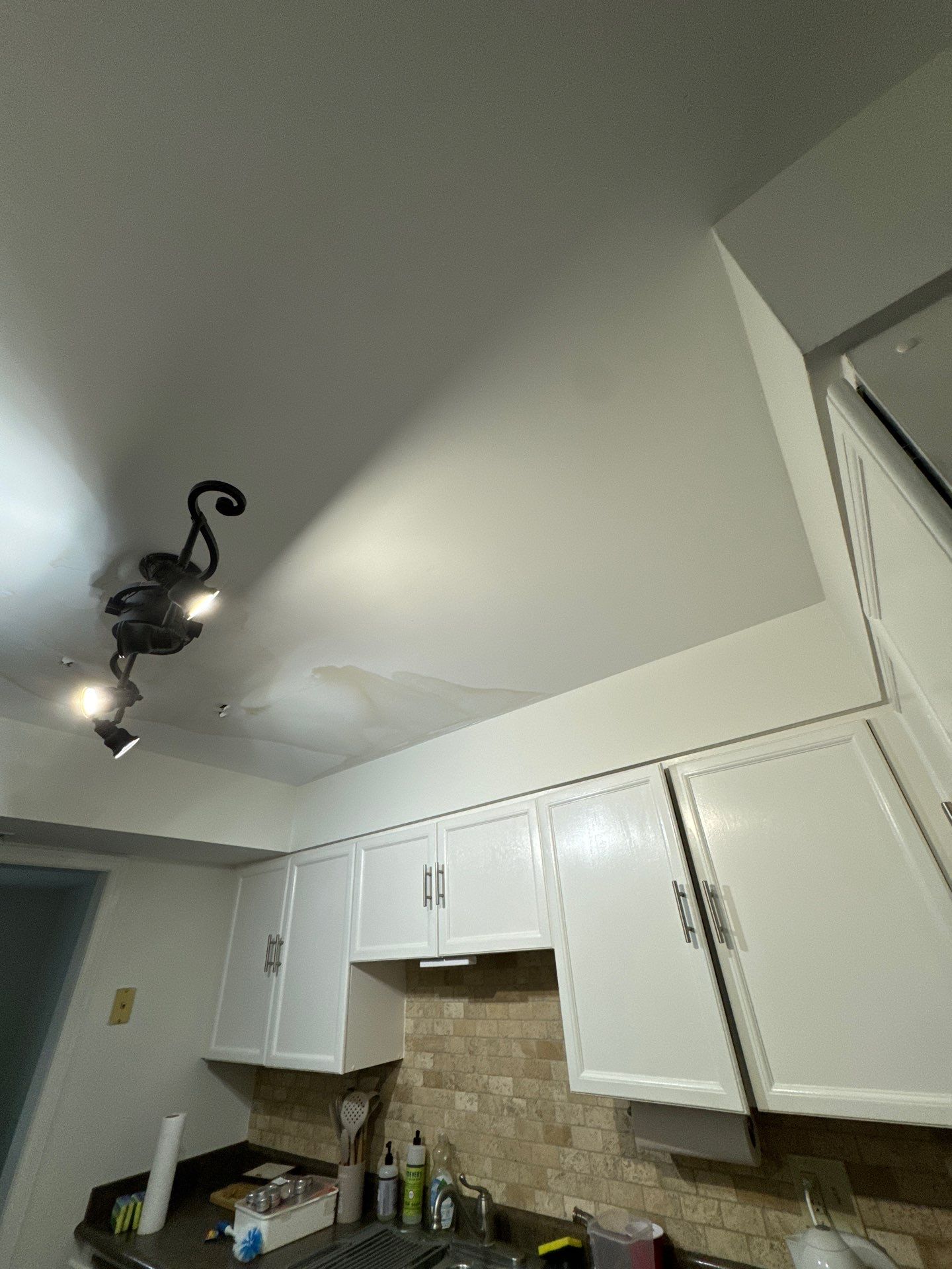 Structural drying equipment positioned throughout affected area during water damage restoration.