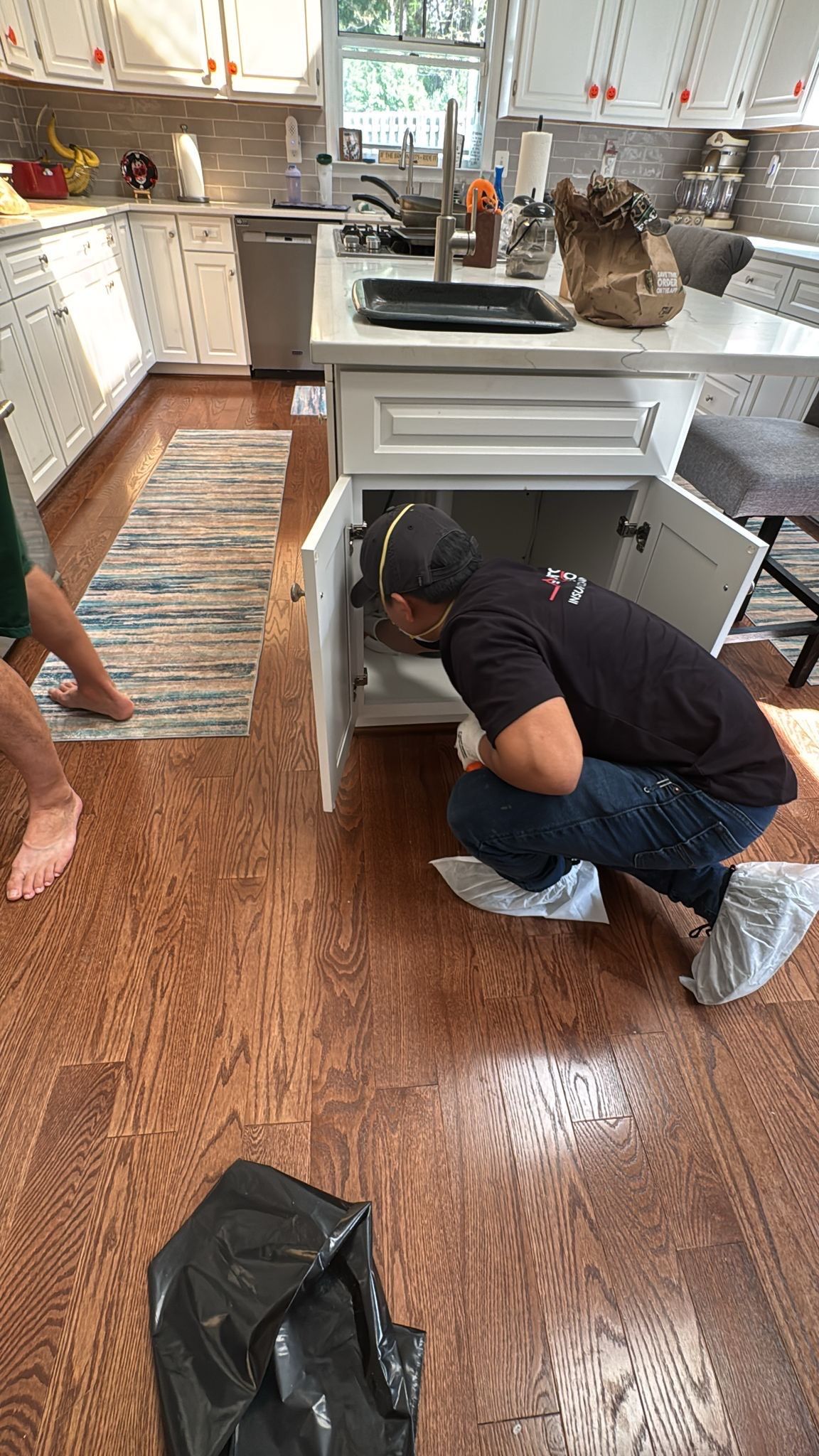 Air movers and moisture-control equipment arranged for continued drying and air circulation in water damage restoration.