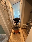 Final inspection of dried flooring and structural areas following water damage restoration in Sterling.