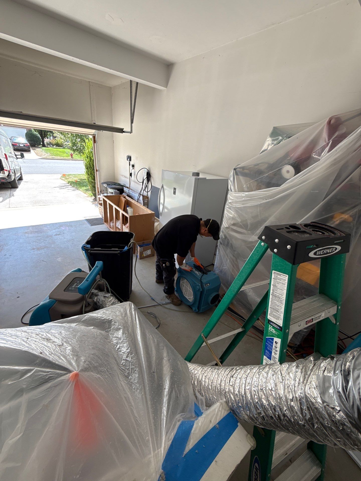 Moisture readings confirm drying progress in the remediation sequence.