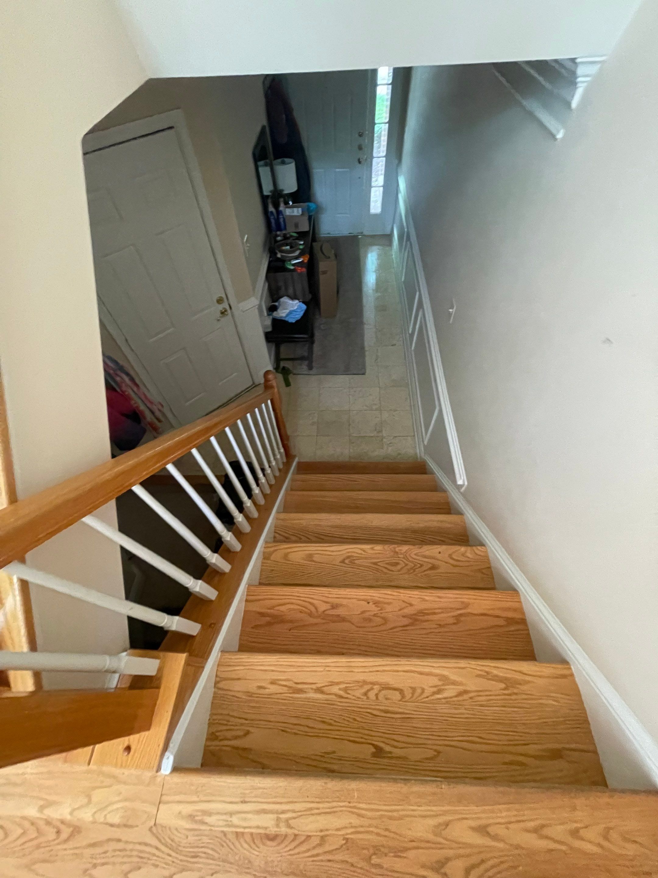Water-damaged carpet and flooring in Arlington home awaiting removal and remediation.