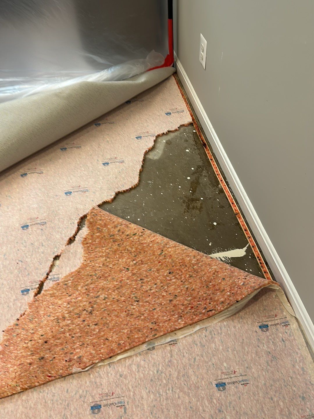 Moisture monitoring during active drying cycle in Arlington water damage restoration.
