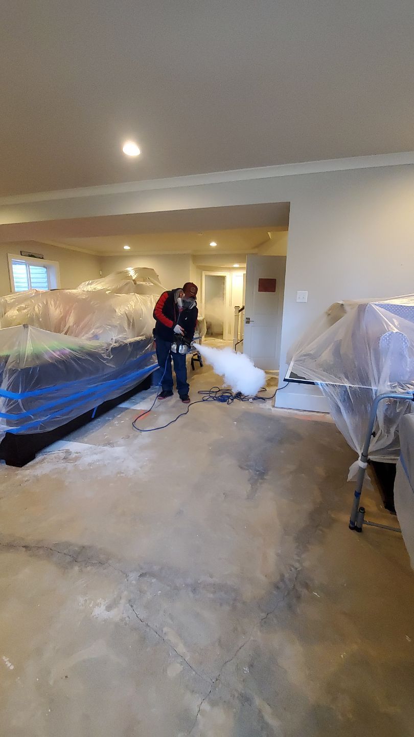 Drying process in progress with air movers and dehumidifiers managing humidity levels throughout space.