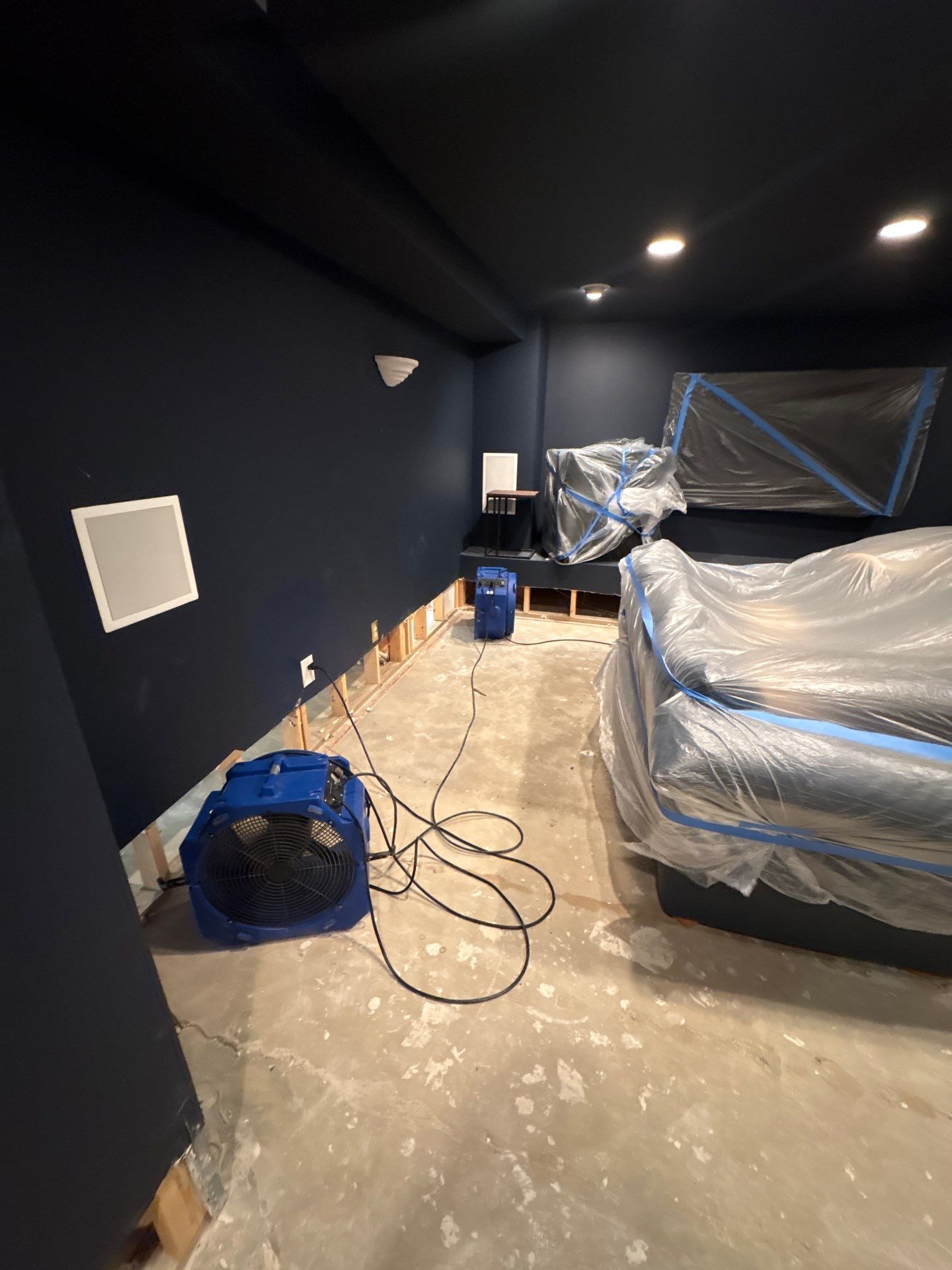 Water damage restoration complete with structural drying finished and remediation work concluded.