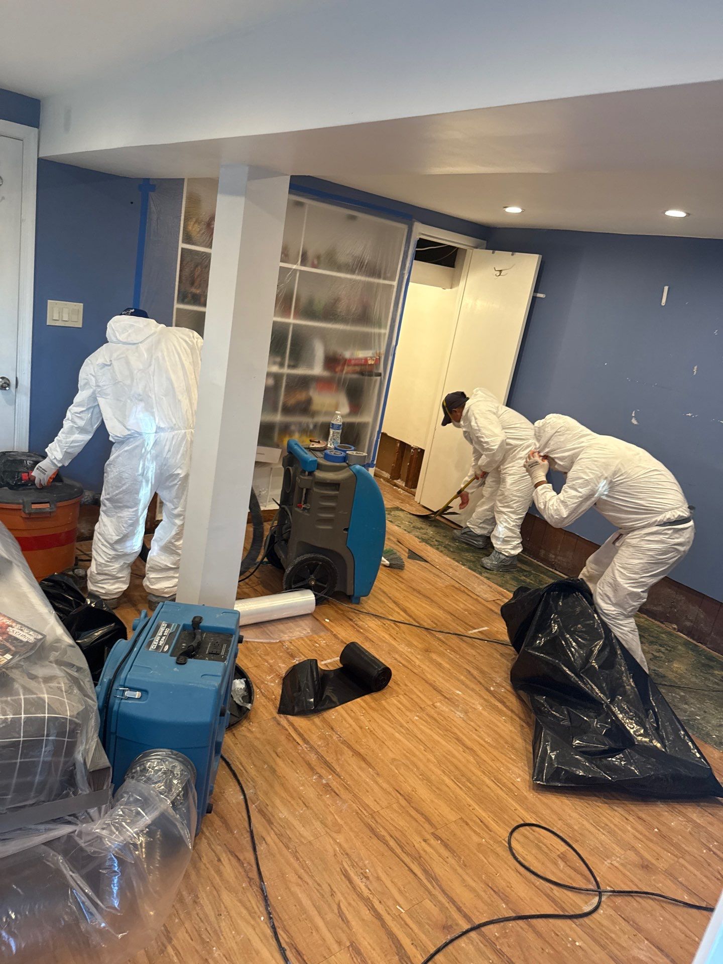 Wall replacement completed and containment removed, remediation work finished in Catlett home.