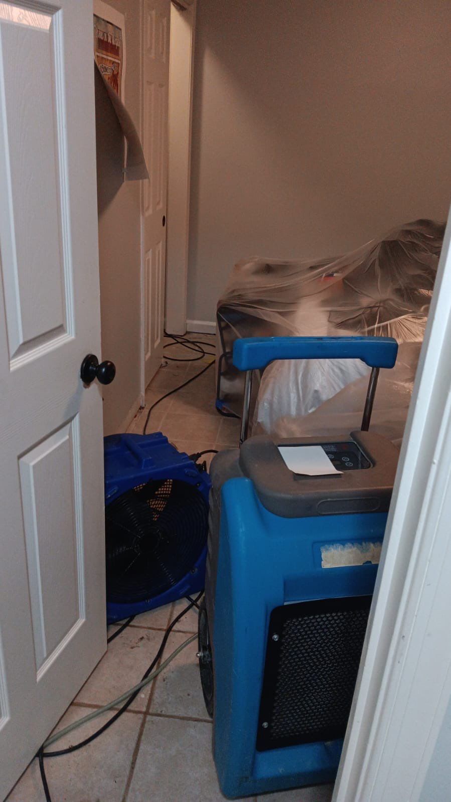 Mold remediation underway in McLean with dehumidification equipment positioned for structural drying.