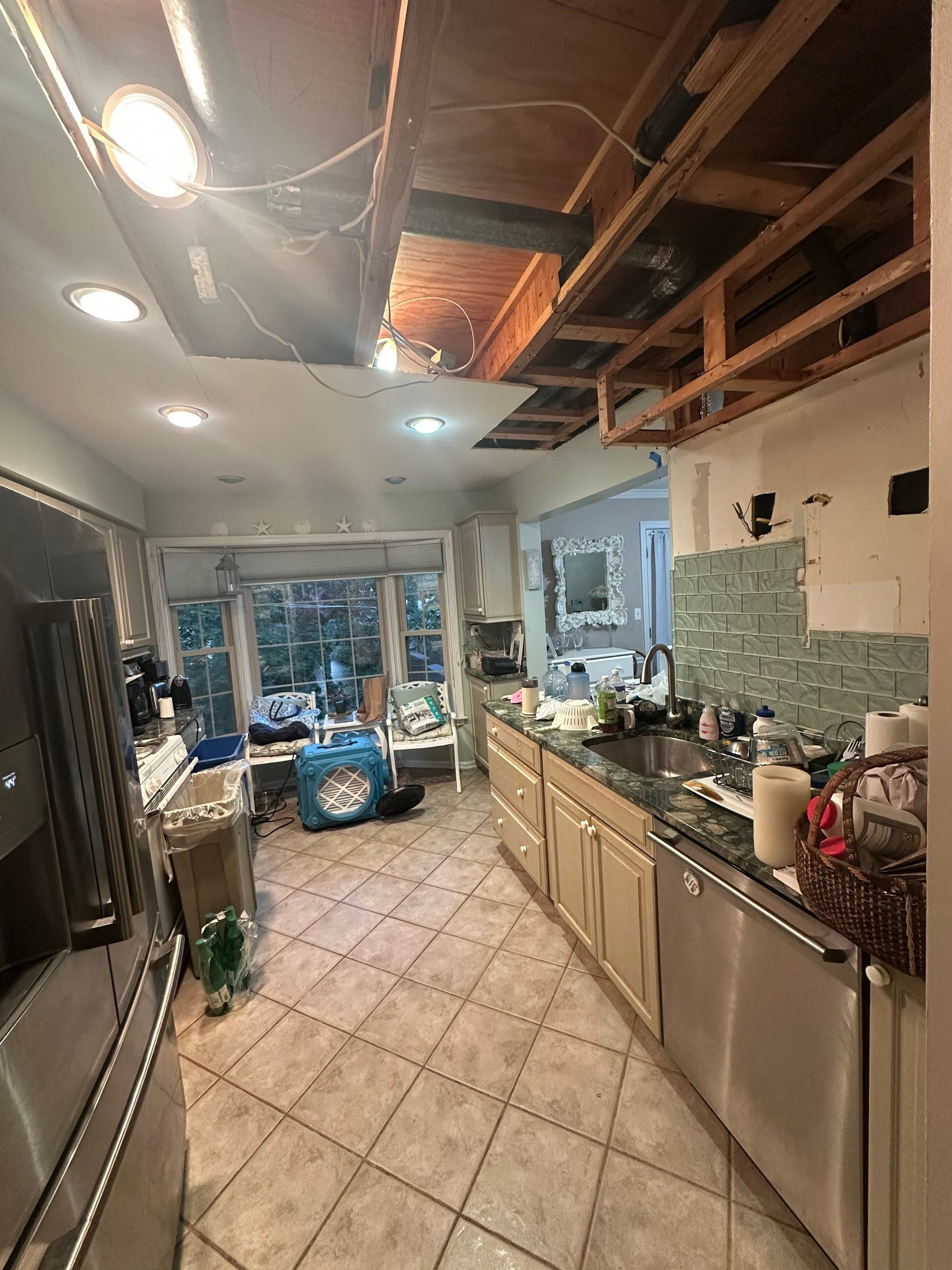 Mold remediation in Church, VA: ceiling damage and containment setup before sanitizing and repair work begins.