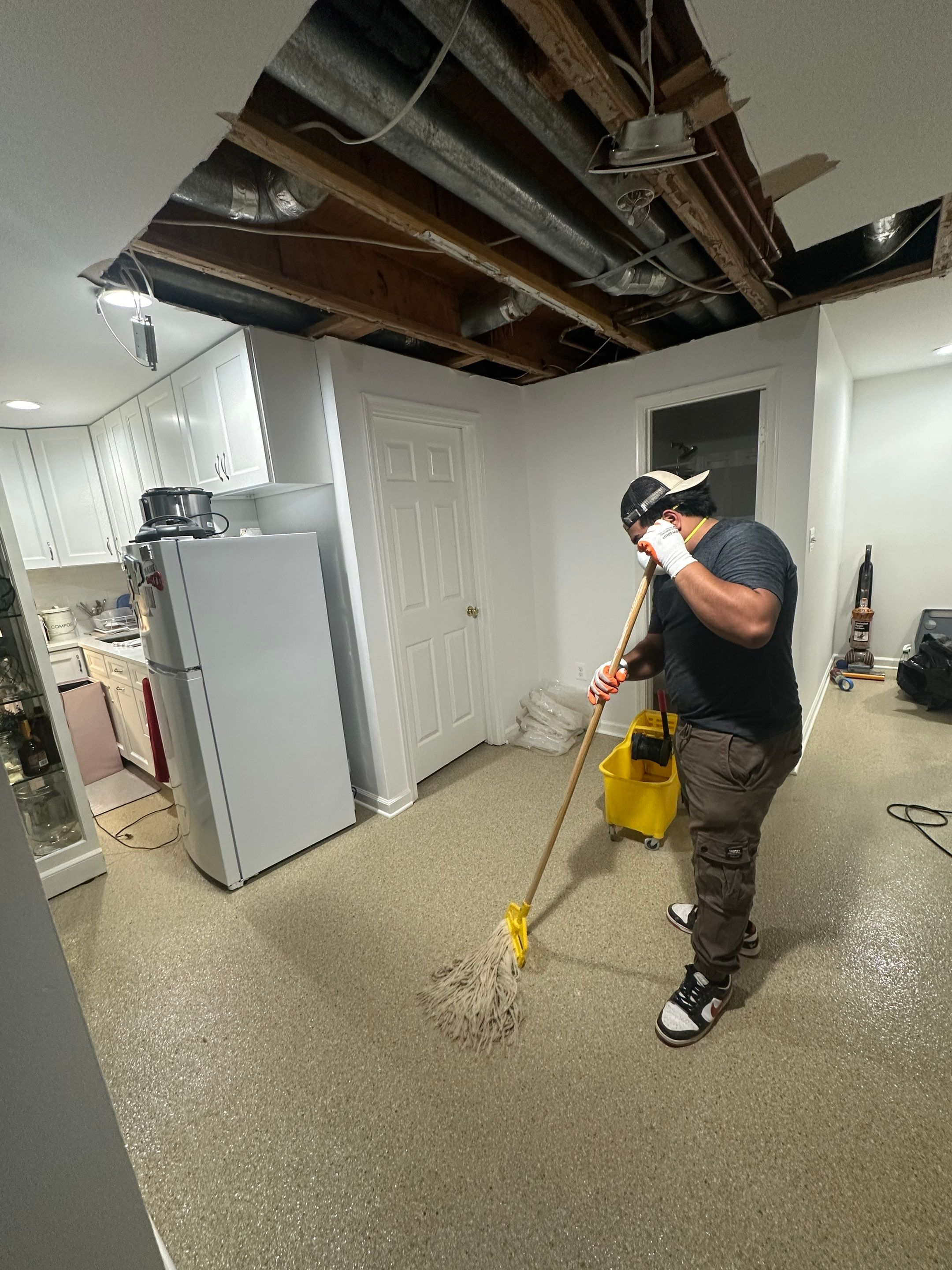 Containment barrier and antimicrobial application during mold remediation ceiling work in Church.