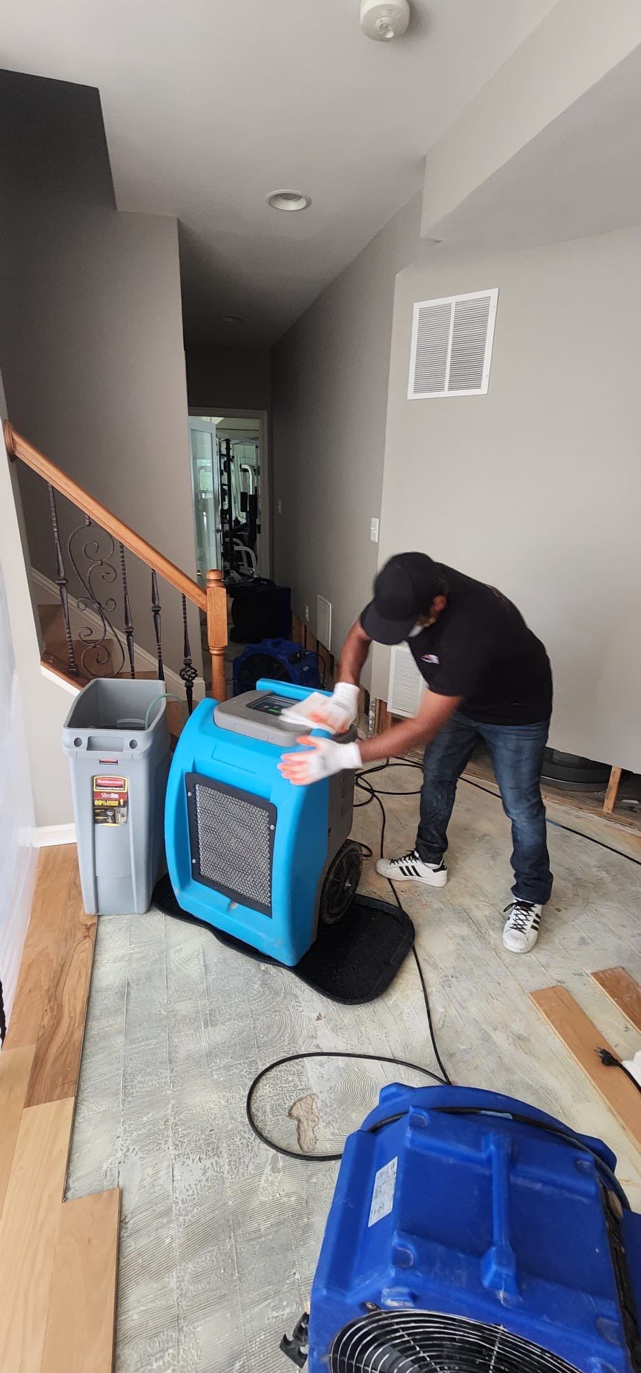 Final stage of water damage restoration in Ashburn showing dried flooring and cleared equipment after remediation.