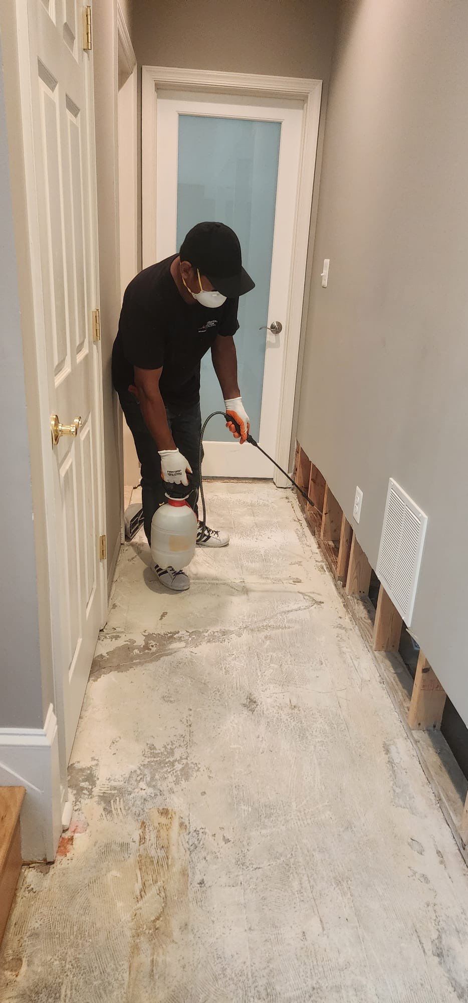 Continued dehumidification process with equipment monitoring structural moisture levels during water restoration.