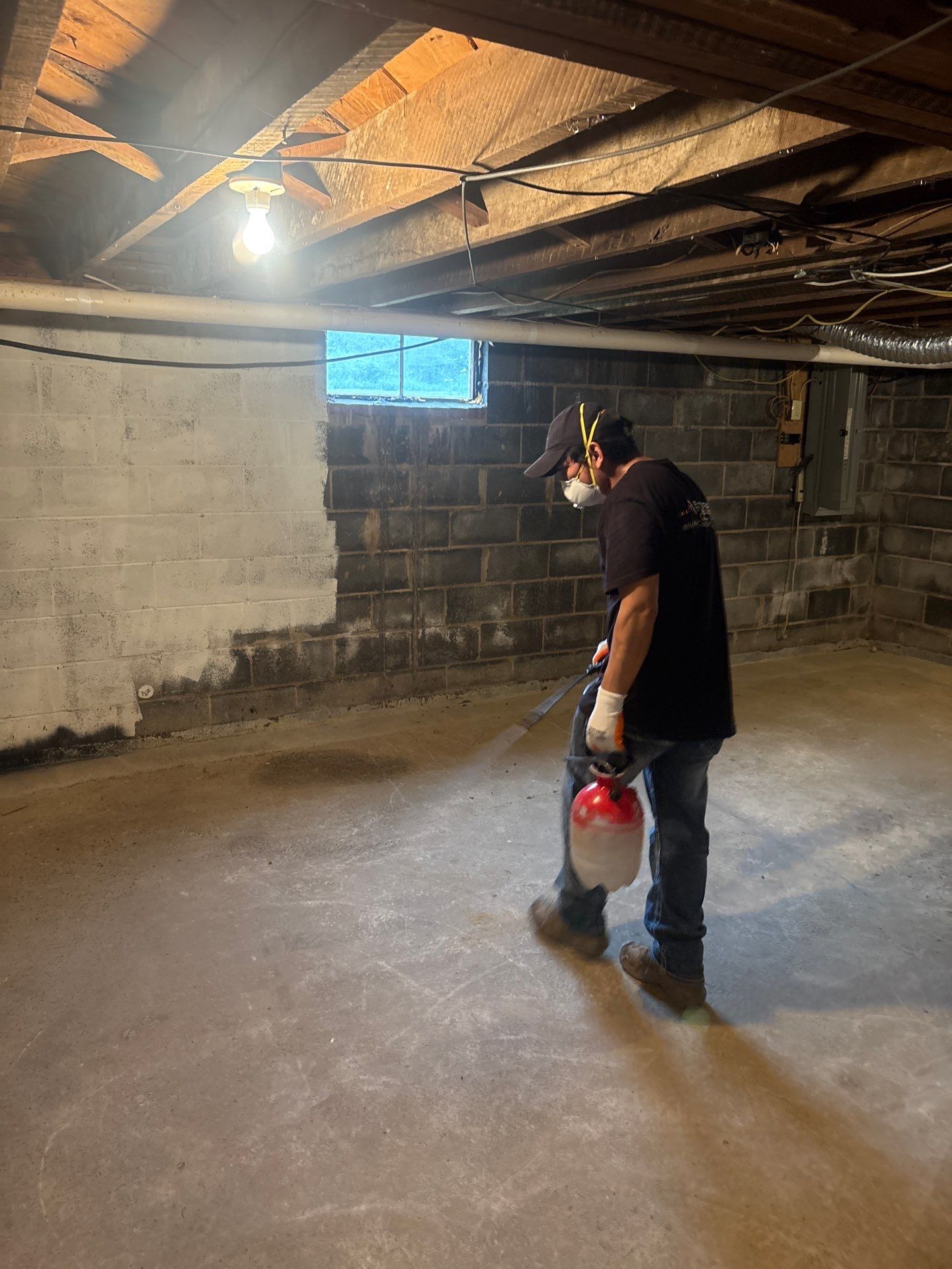 Structural drying equipment positioned to remove residual moisture from walls and flooring.