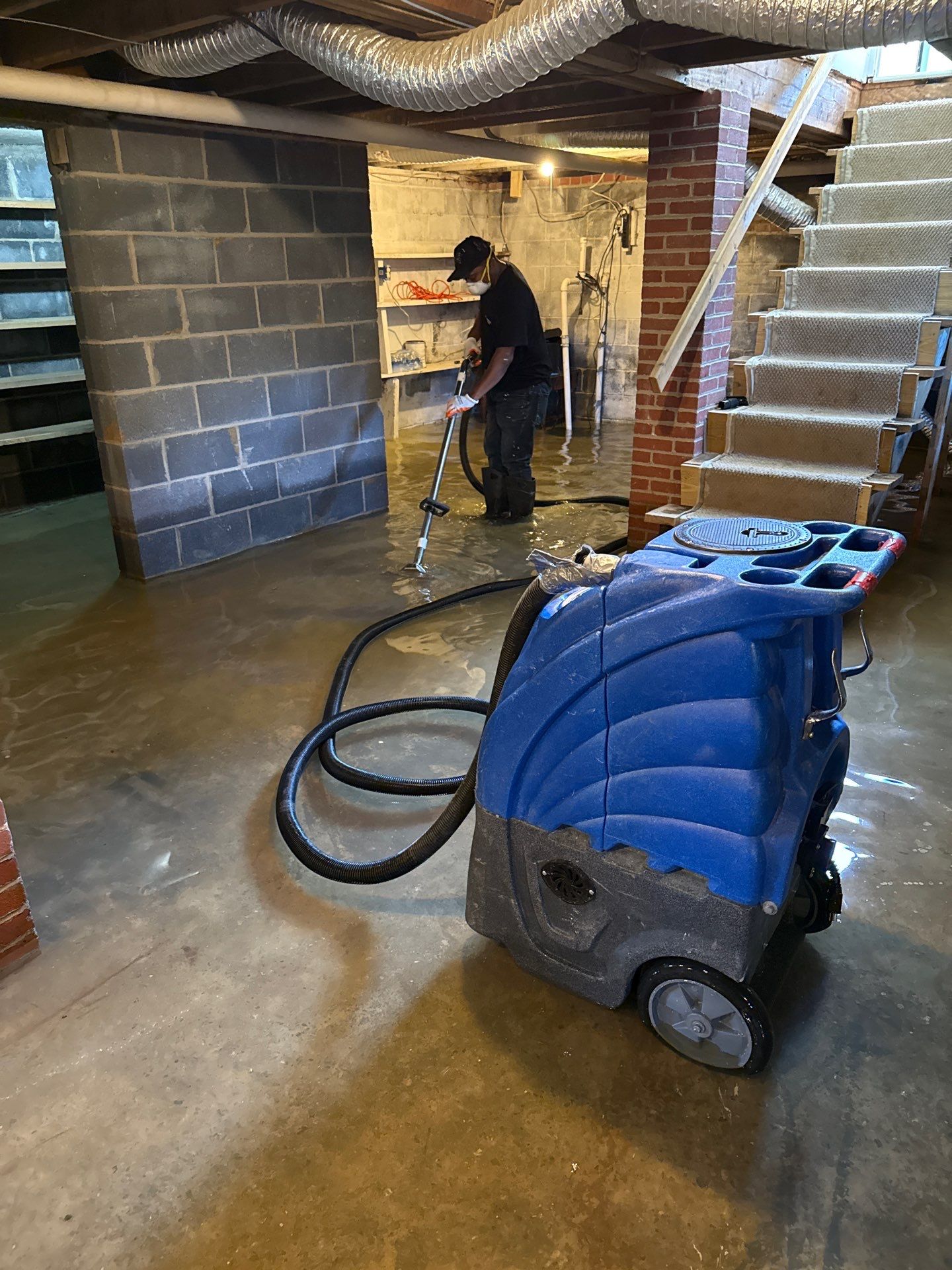 Containment and air management during active mold remediation work in Huntly.