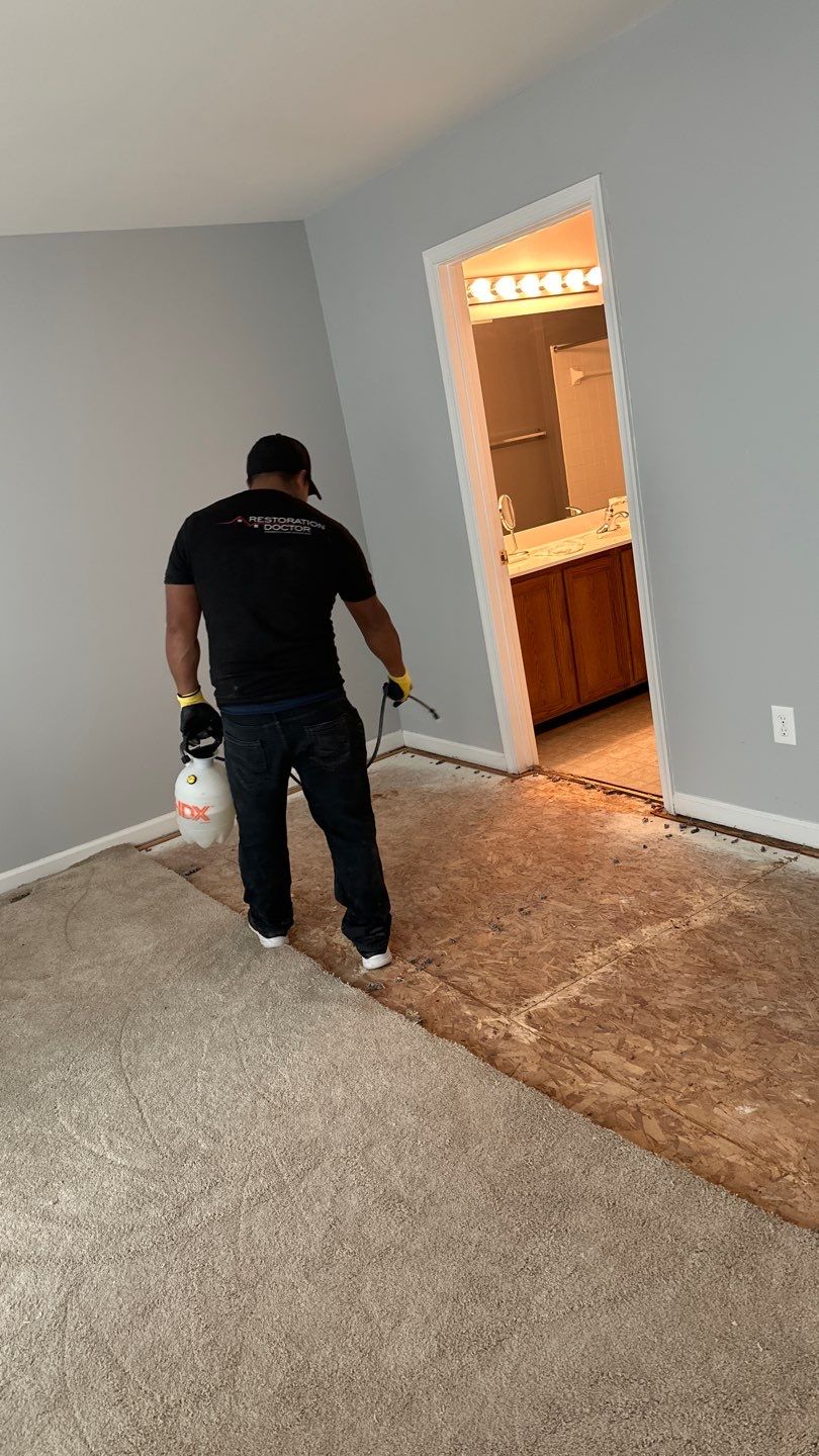 Final-stage water restoration in Manassas with drying equipment and sanitization work nearing completion.