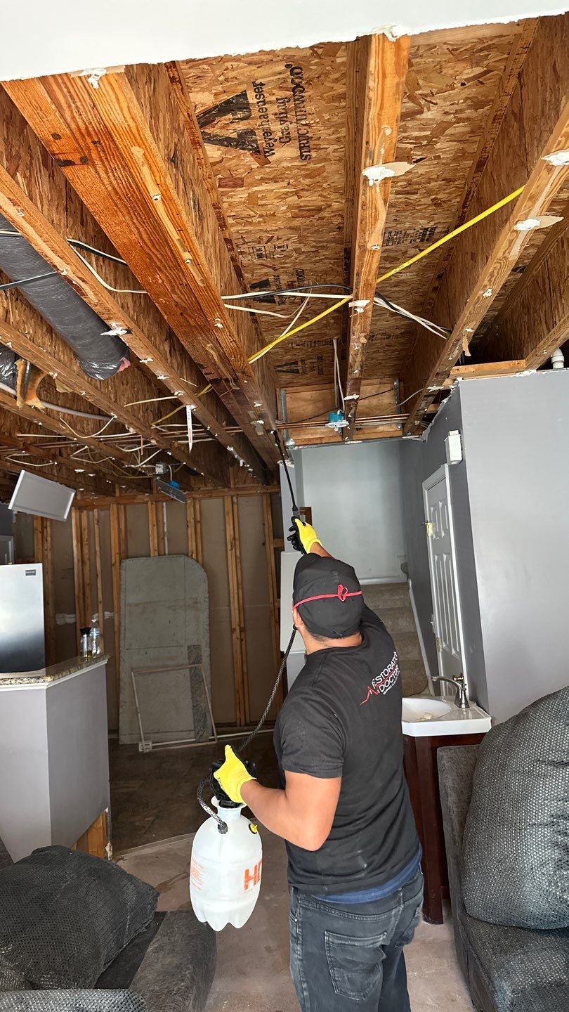 Structural drying in progress with moisture extraction equipment positioned throughout the room.