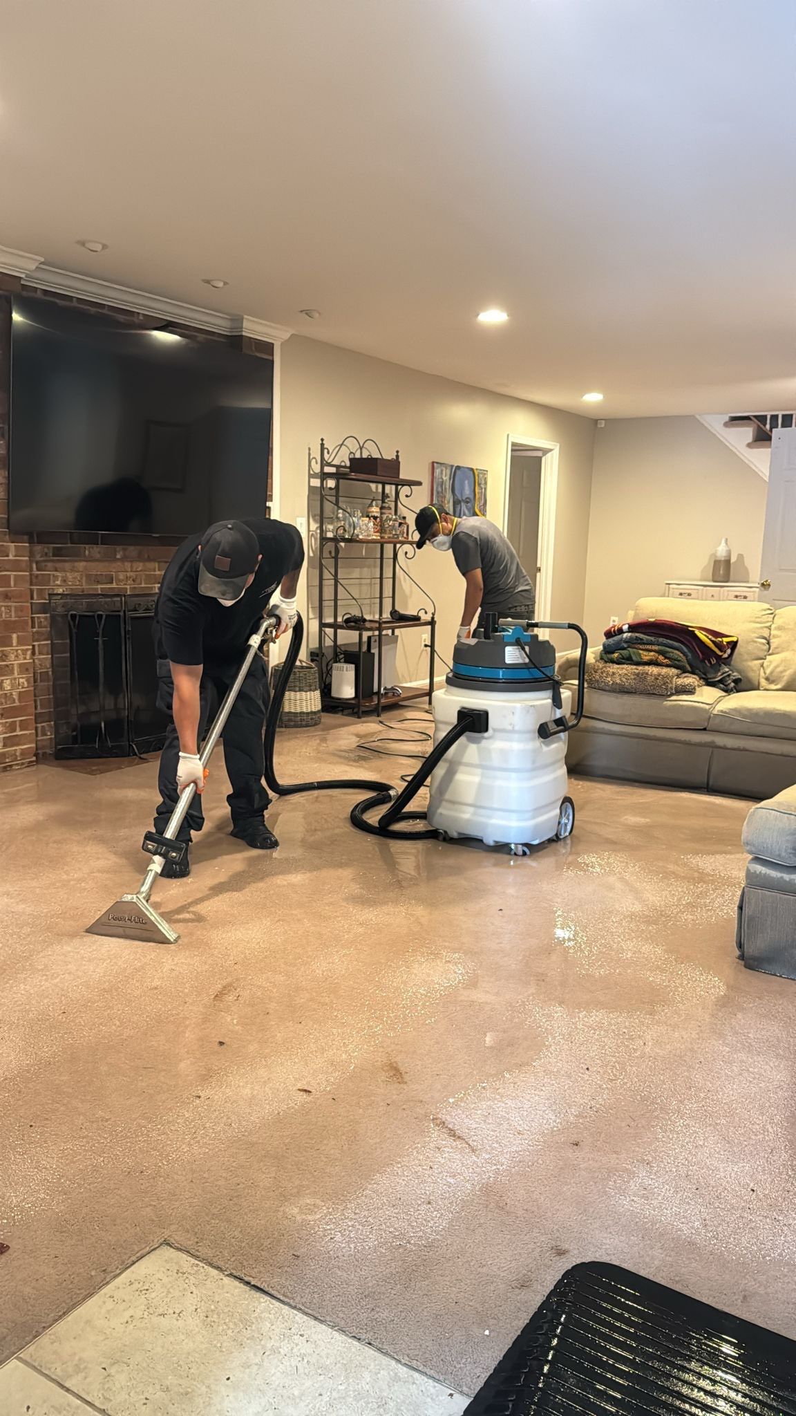 Final inspection of dried structural surfaces following water damage restoration completion.