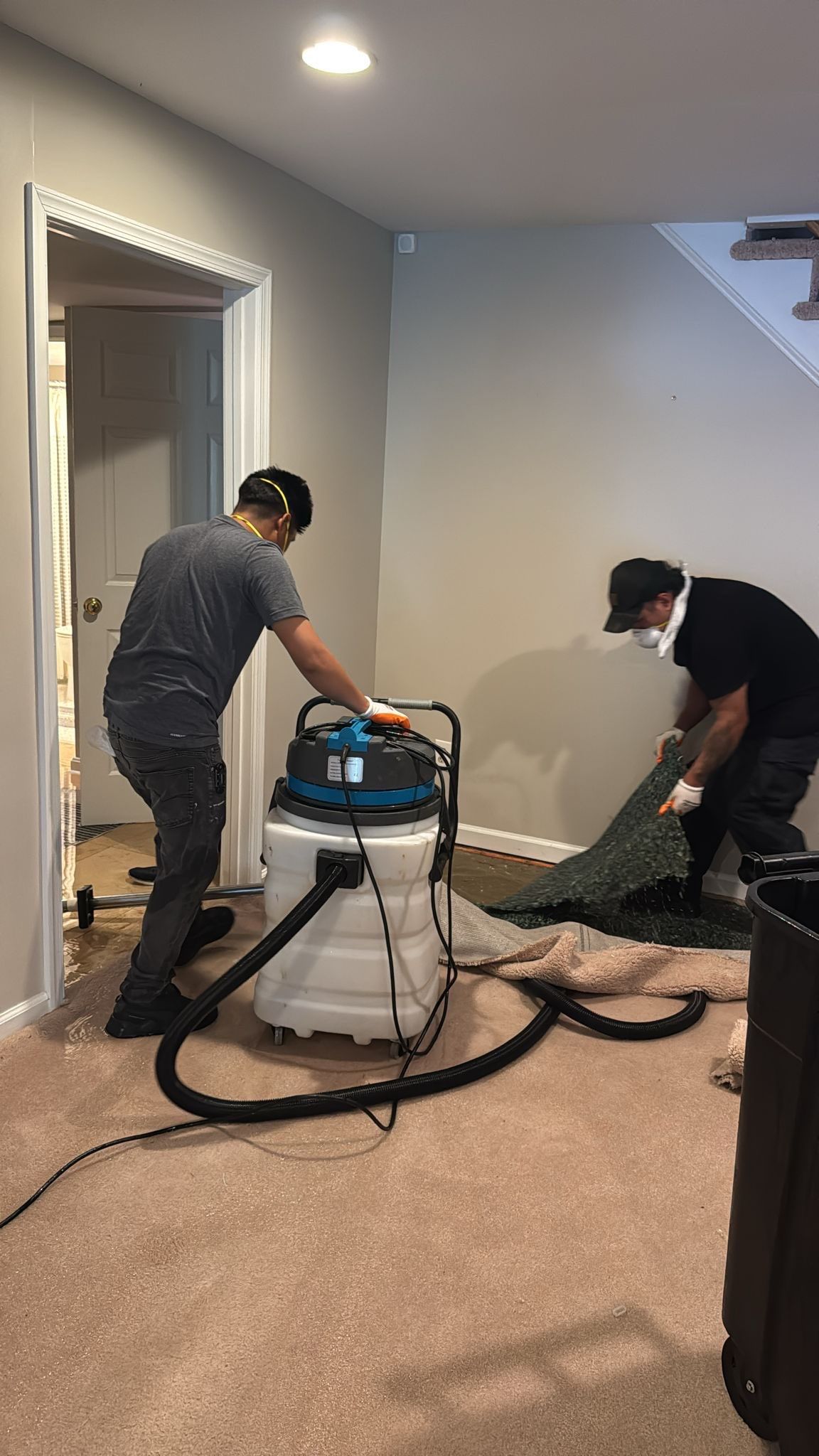 Continued drying phase with equipment placement for thorough moisture removal.
