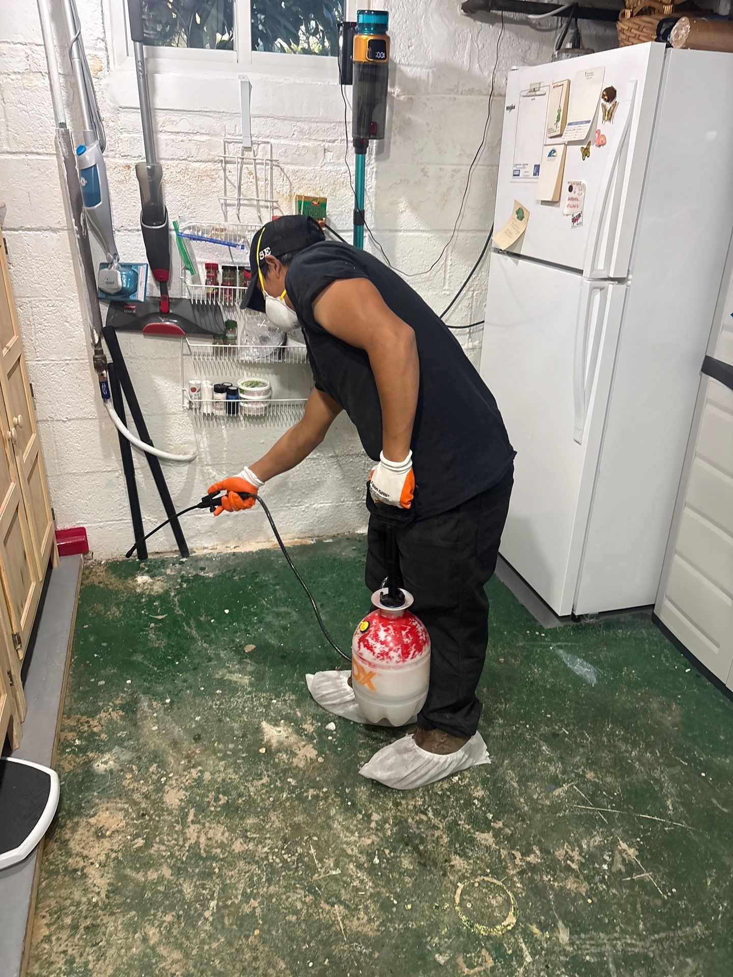 Standing water pooled across Arlington home interior during initial water damage assessment and extraction phase.