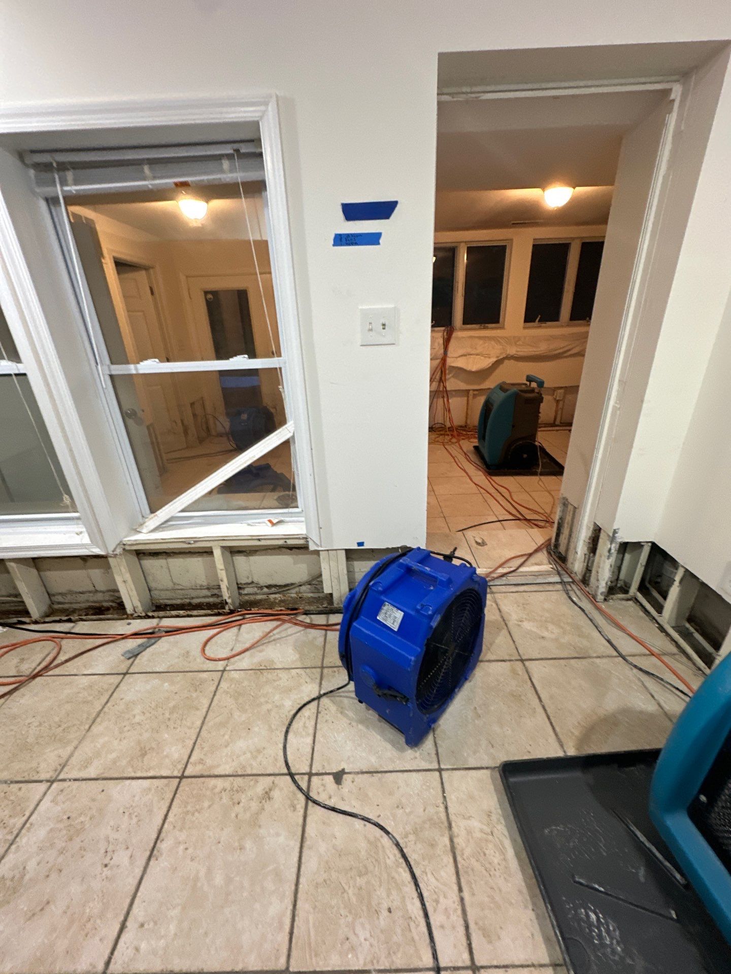 Water damage restoration in Church, VA: structural drying equipment positioned in affected area.
