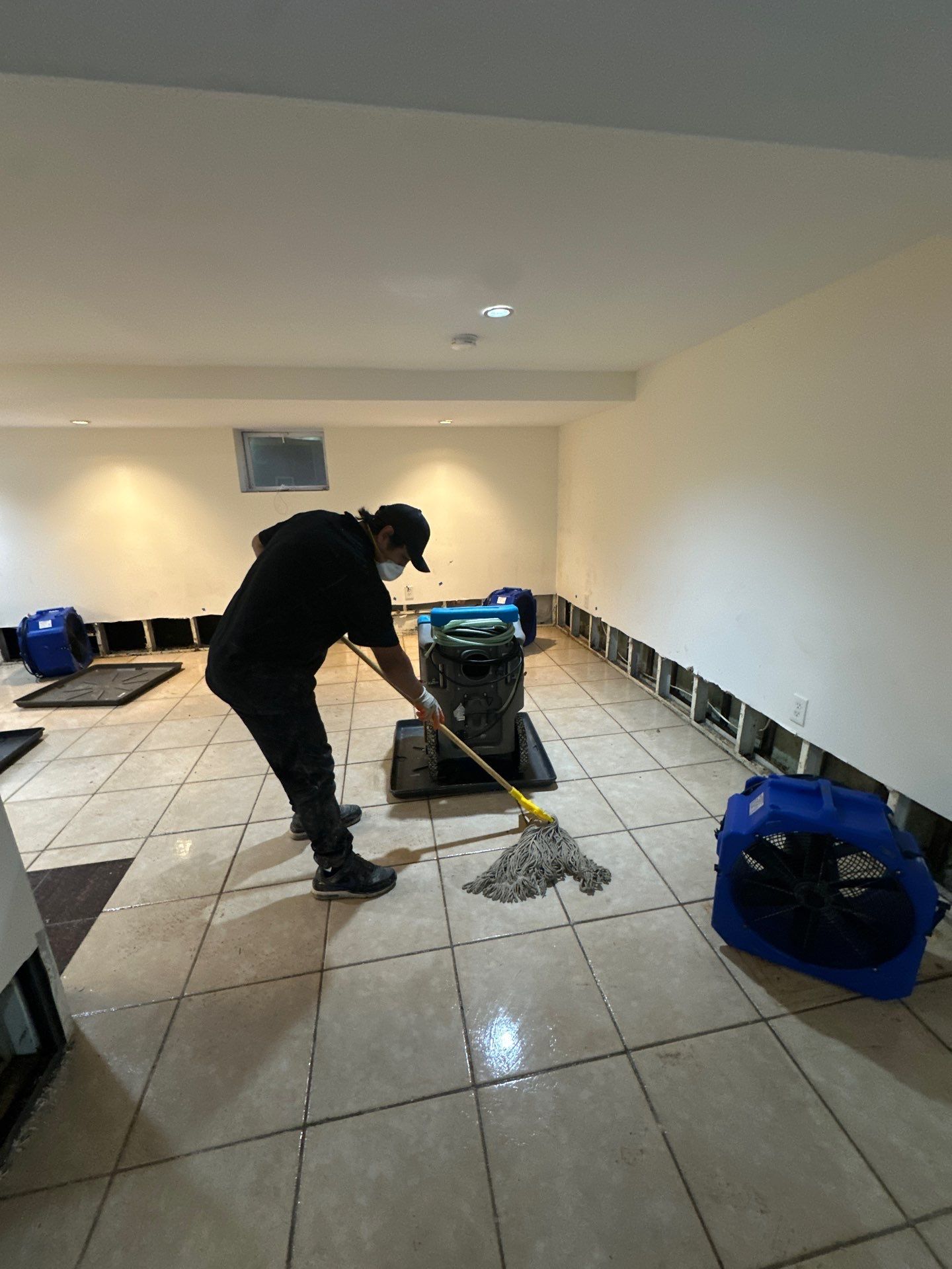 Sanitizing and moisture monitoring continuing across structural surfaces in Church water damage job.