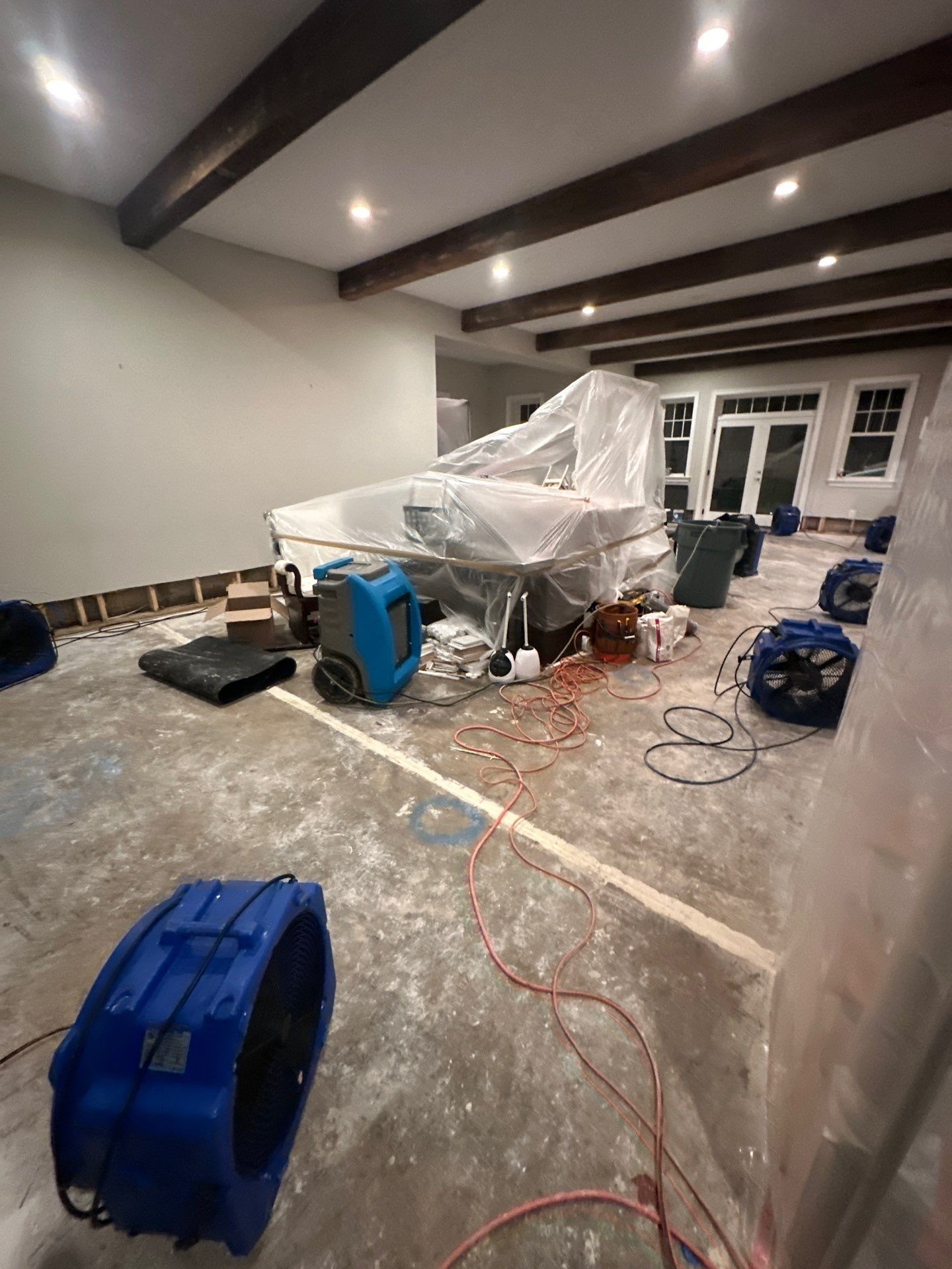 Final inspection of dried and treated surfaces following Arlington water damage restoration.