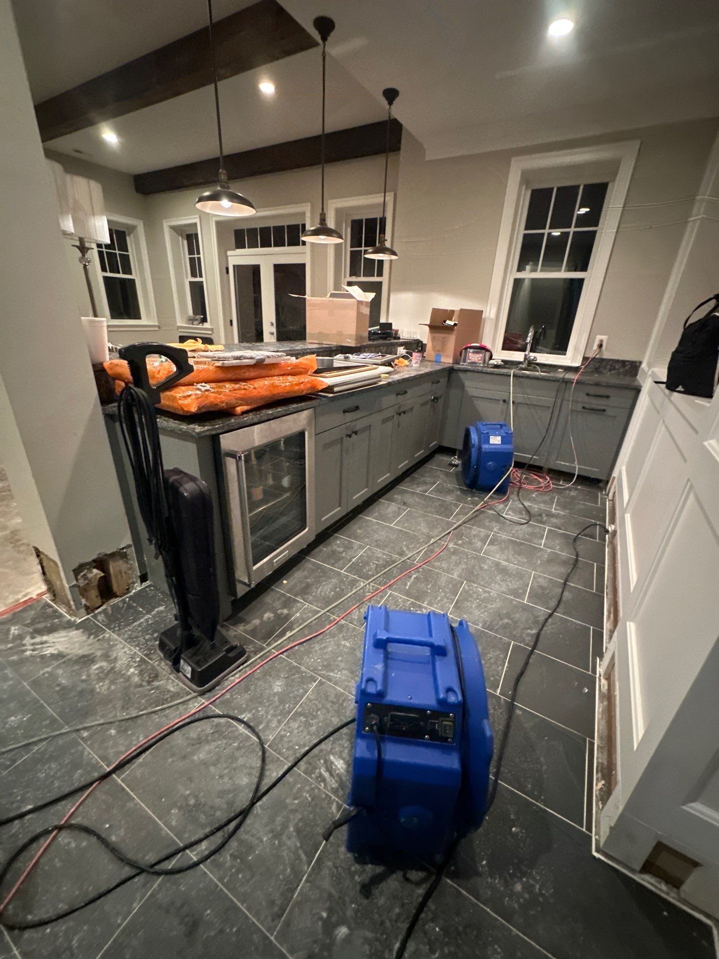 Structural drying equipment positioned within containment during Arlington water damage restoration.