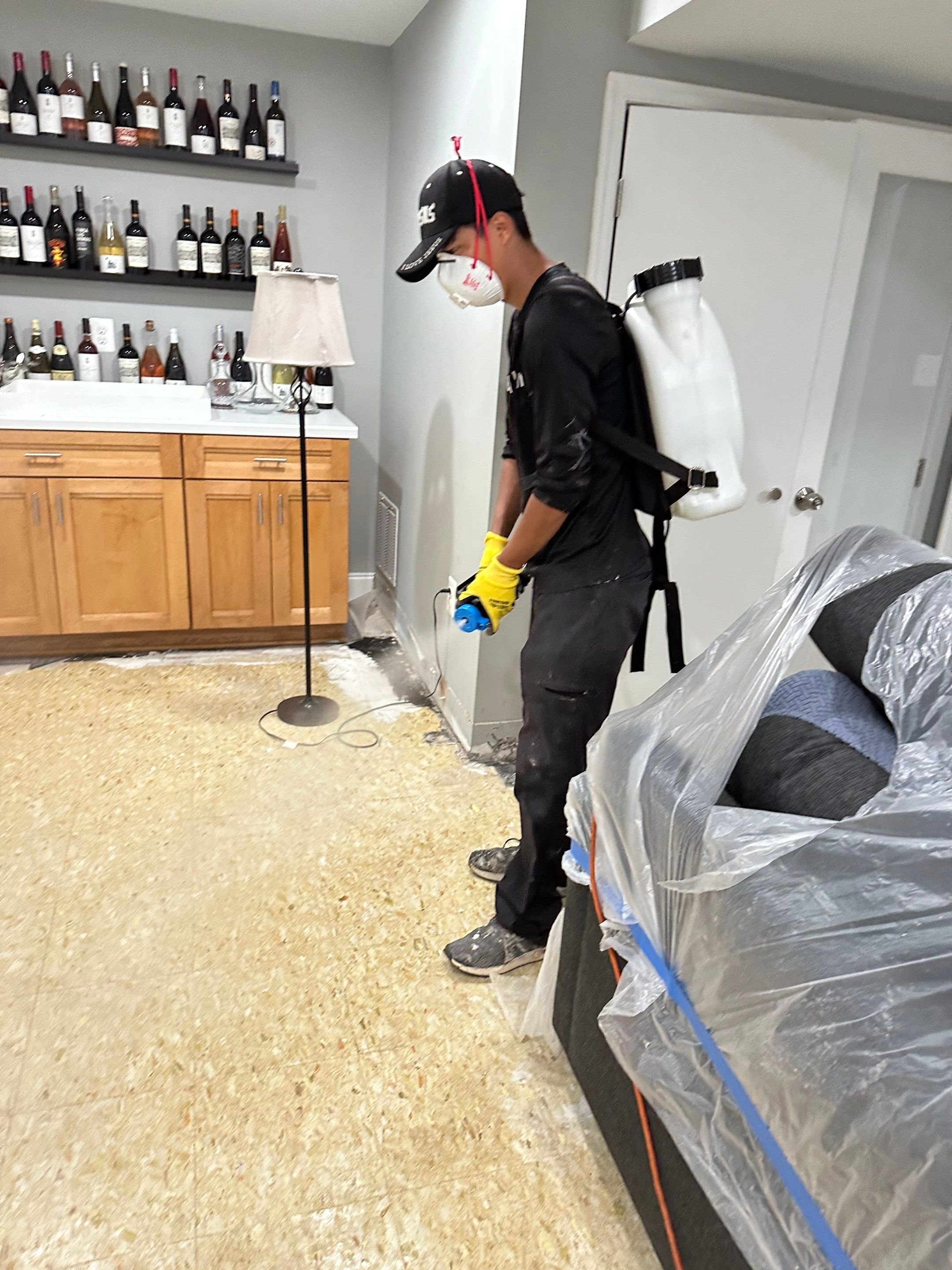 Drying process underway with air movers and dehumidifiers extracting moisture from affected areas.
