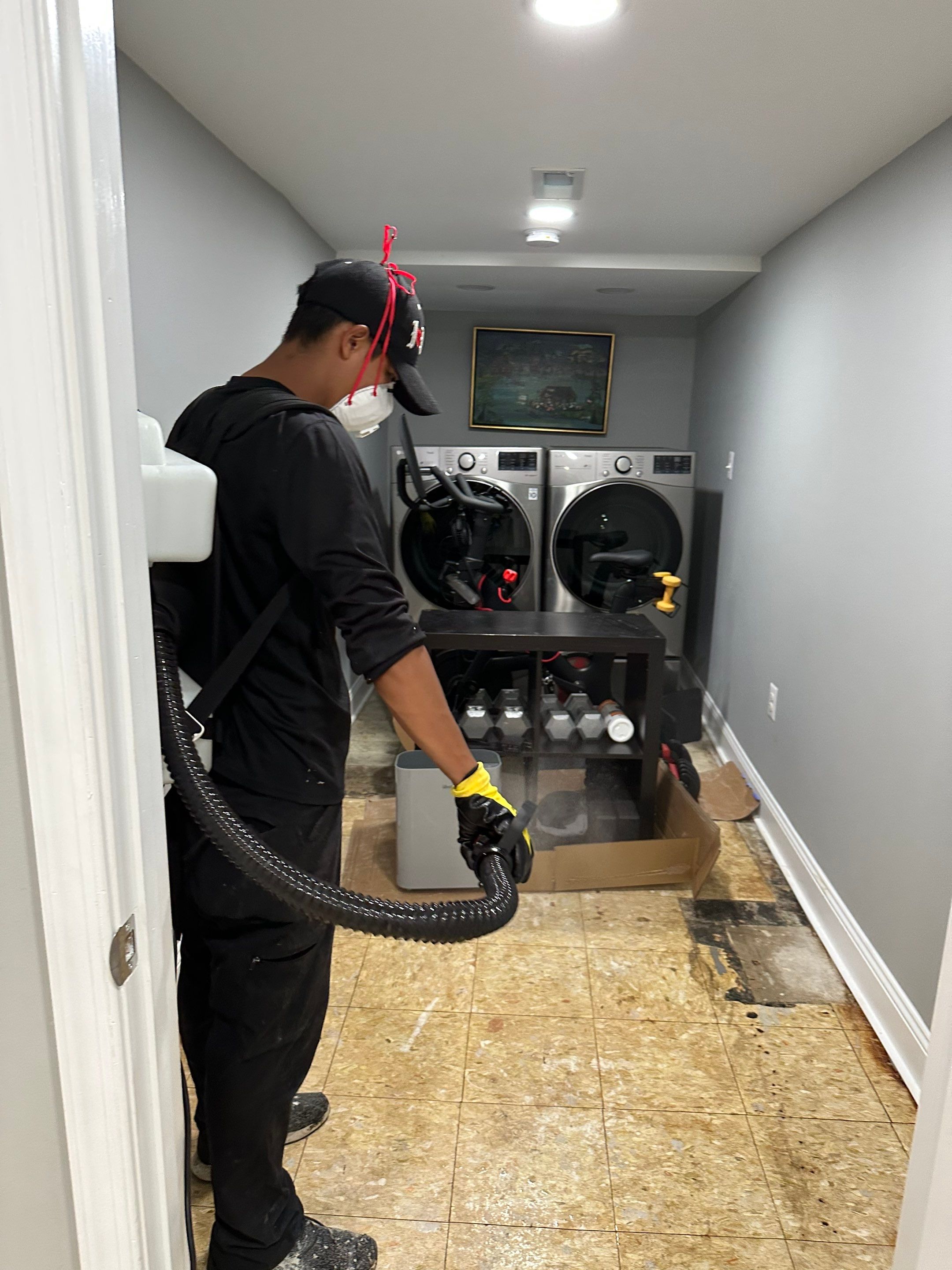 Dehumidification equipment positioned during structural drying phase of water damage restoration.