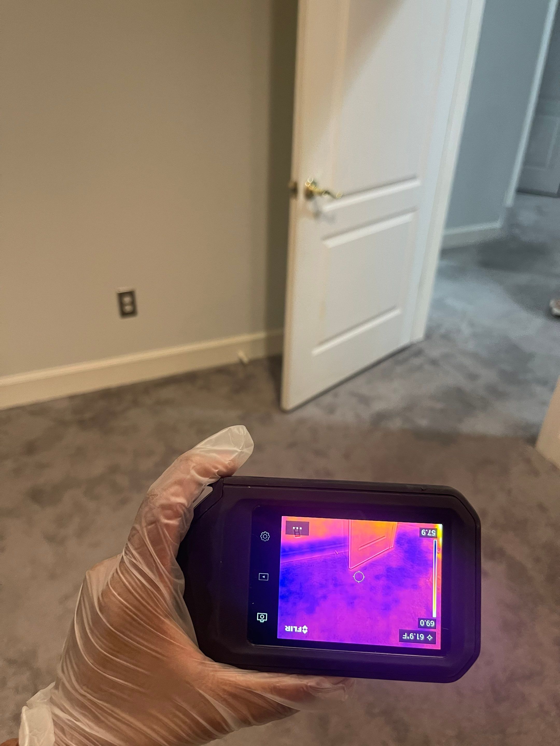 Moisture mapping in progress across affected surfaces during Vienna water damage drying sequence.