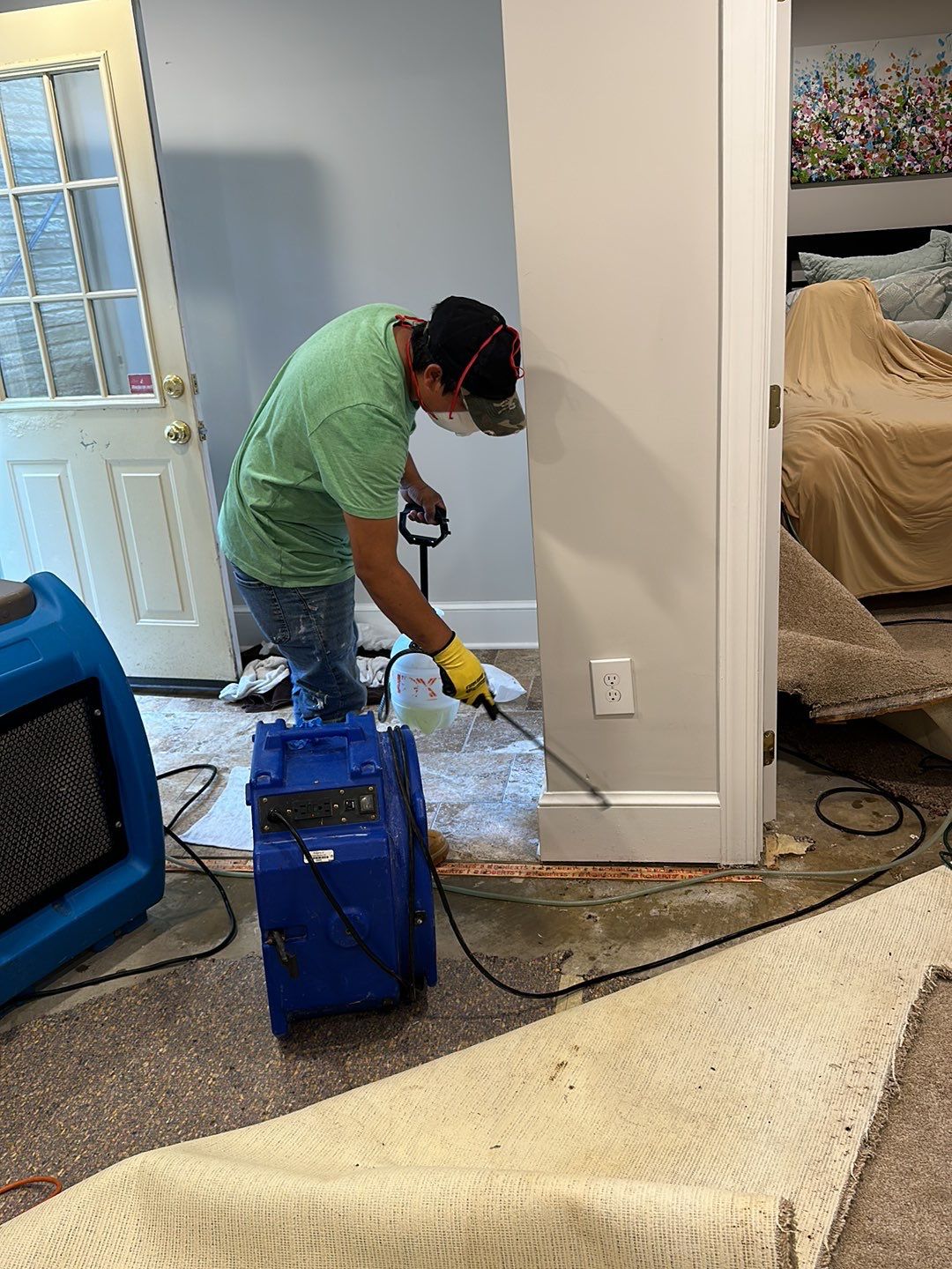 Thermal imaging camera documenting moisture distribution during mold remediation assessment in Falls Church.