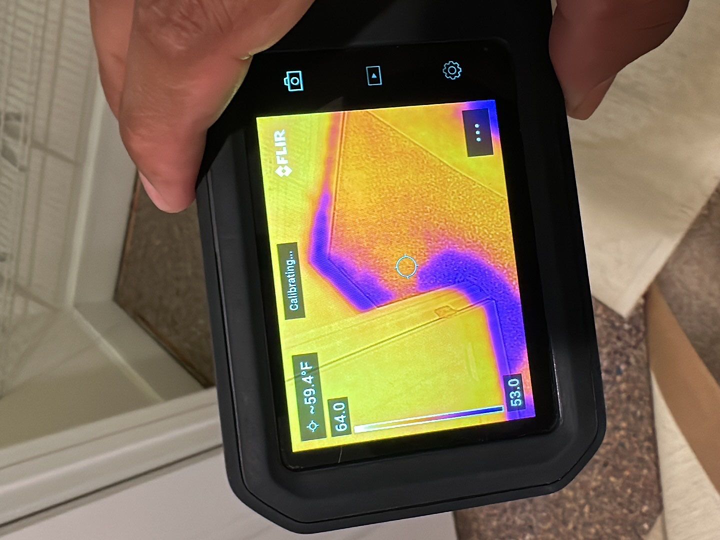 Final moisture verification using thermal imaging to confirm drying completion in Falls Church.