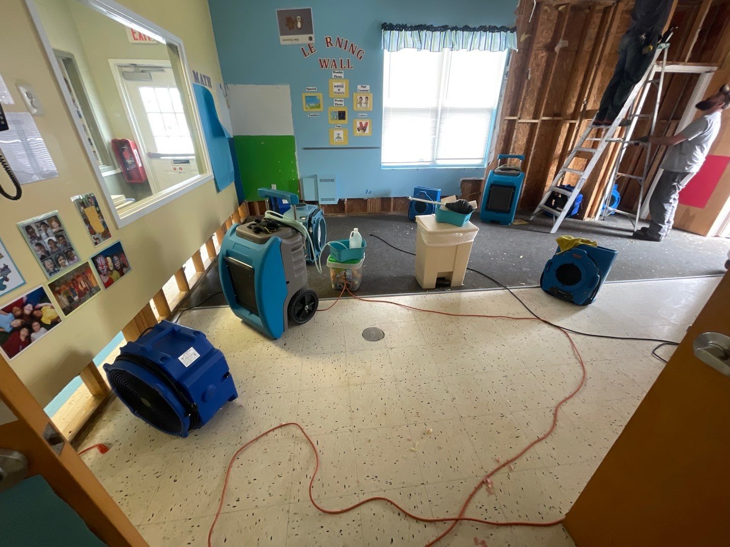 Structural drying equipment deployed across affected areas during water damage restoration.