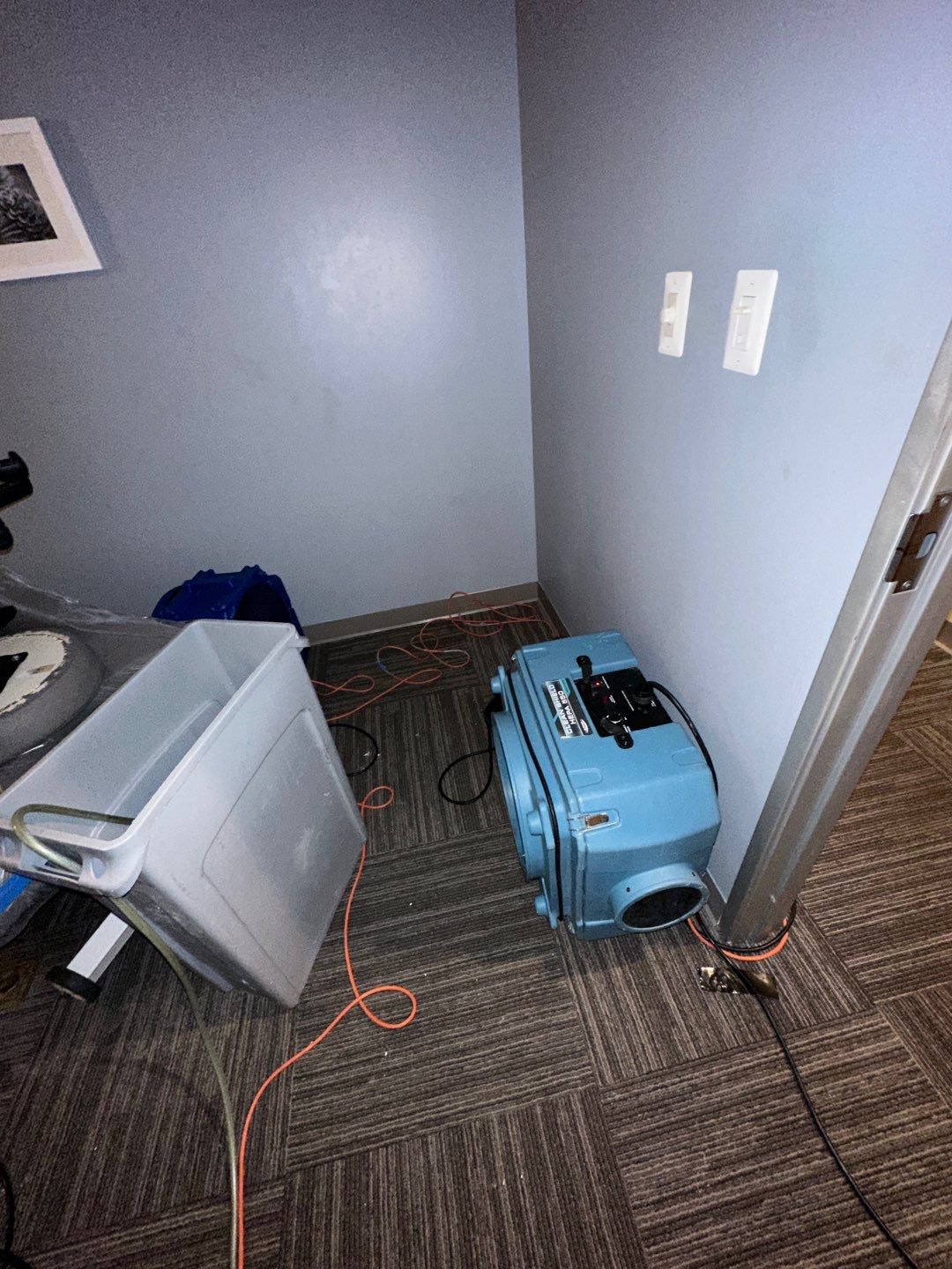 Final-stage water damage restoration in Vienna with equipment removal and structural drying nearing completion.