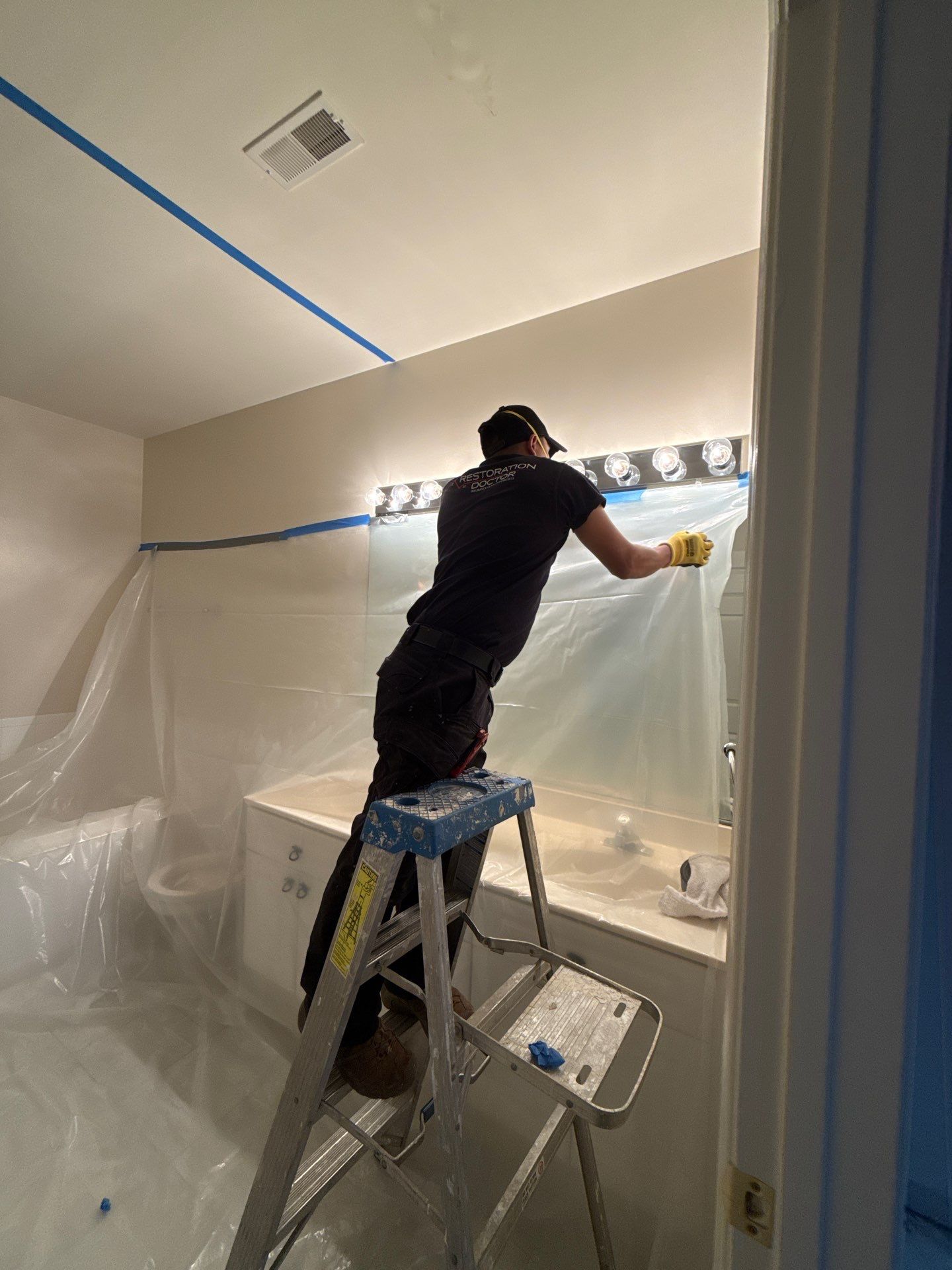 Water extraction continuing in Alexandria; wet materials staged for assessment and removal.