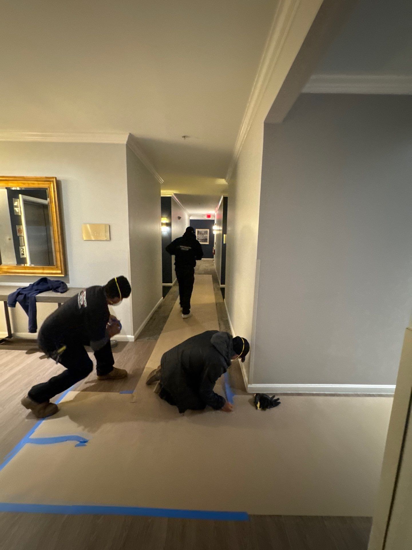 Air circulation and dehumidification active across drying zone in Alexandria mold remediation work.