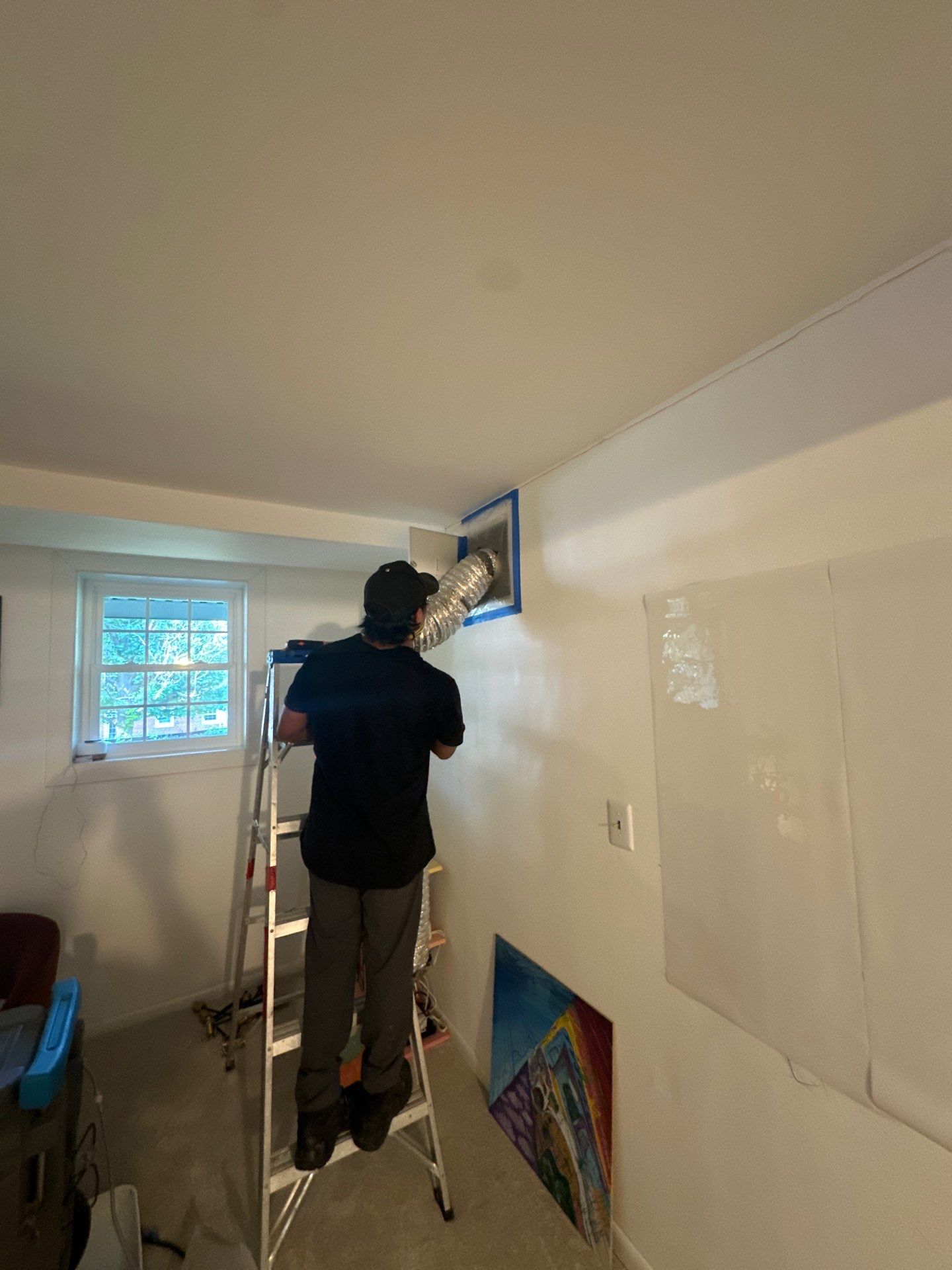 Infrared documentation of moisture migration through wall assembly during active restoration.