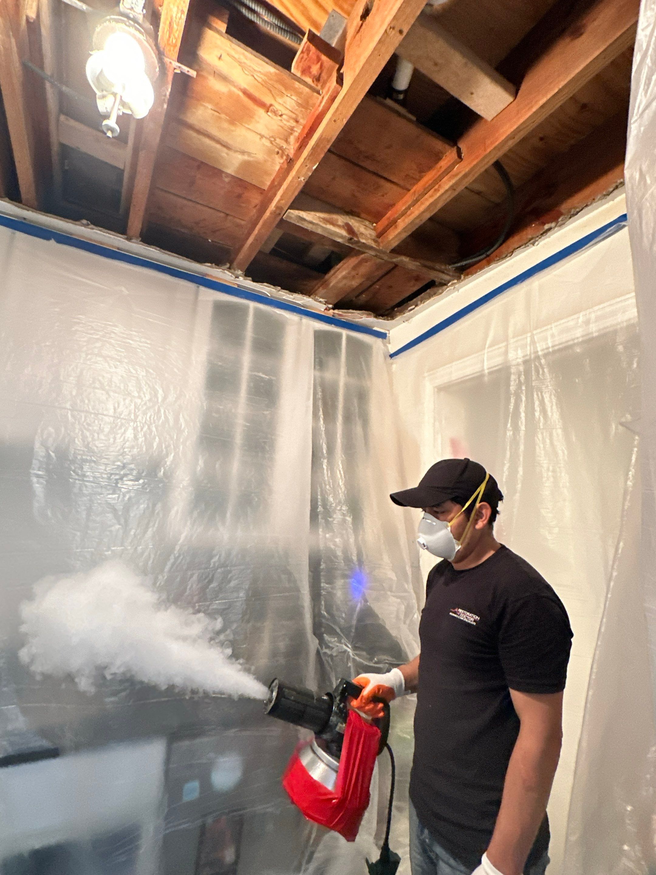 Active sanitizing treatment applied to affected materials during Woodbridge water damage restoration.