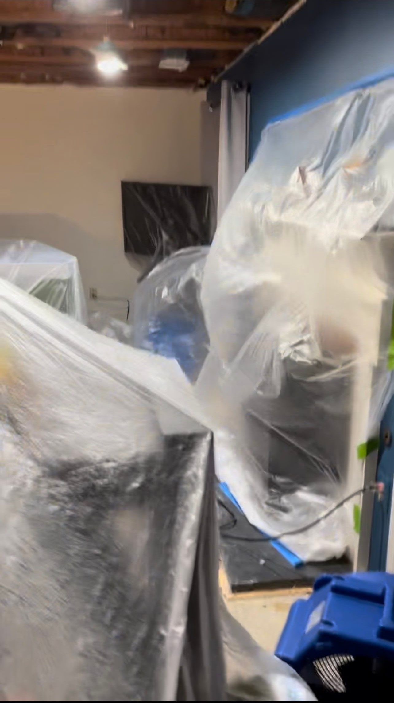Mid-stage drying phase with dehumidification equipment monitoring moisture levels as structural materials prepare for repair.