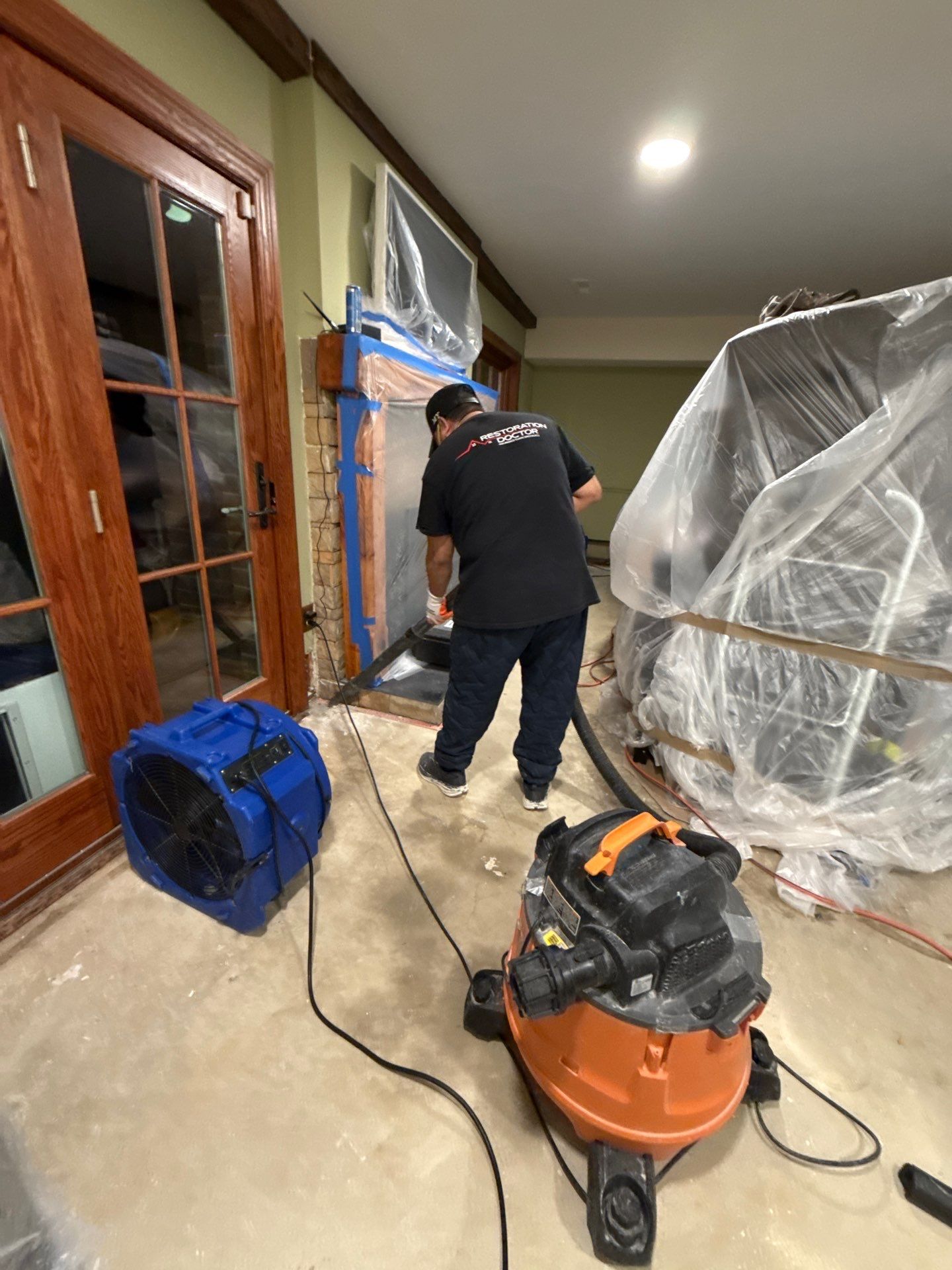 Completed water restoration showing flooring replacement and return to normal conditions in McLean.
