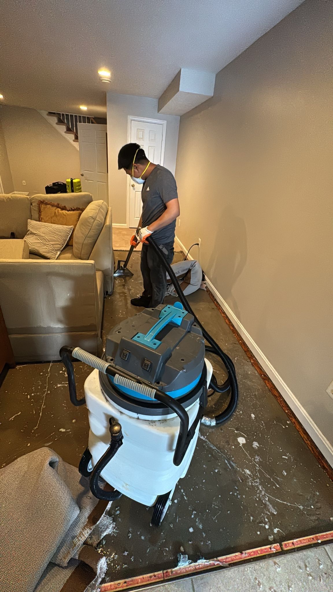 Dehumidifiers and air movers operating during the drying phase.