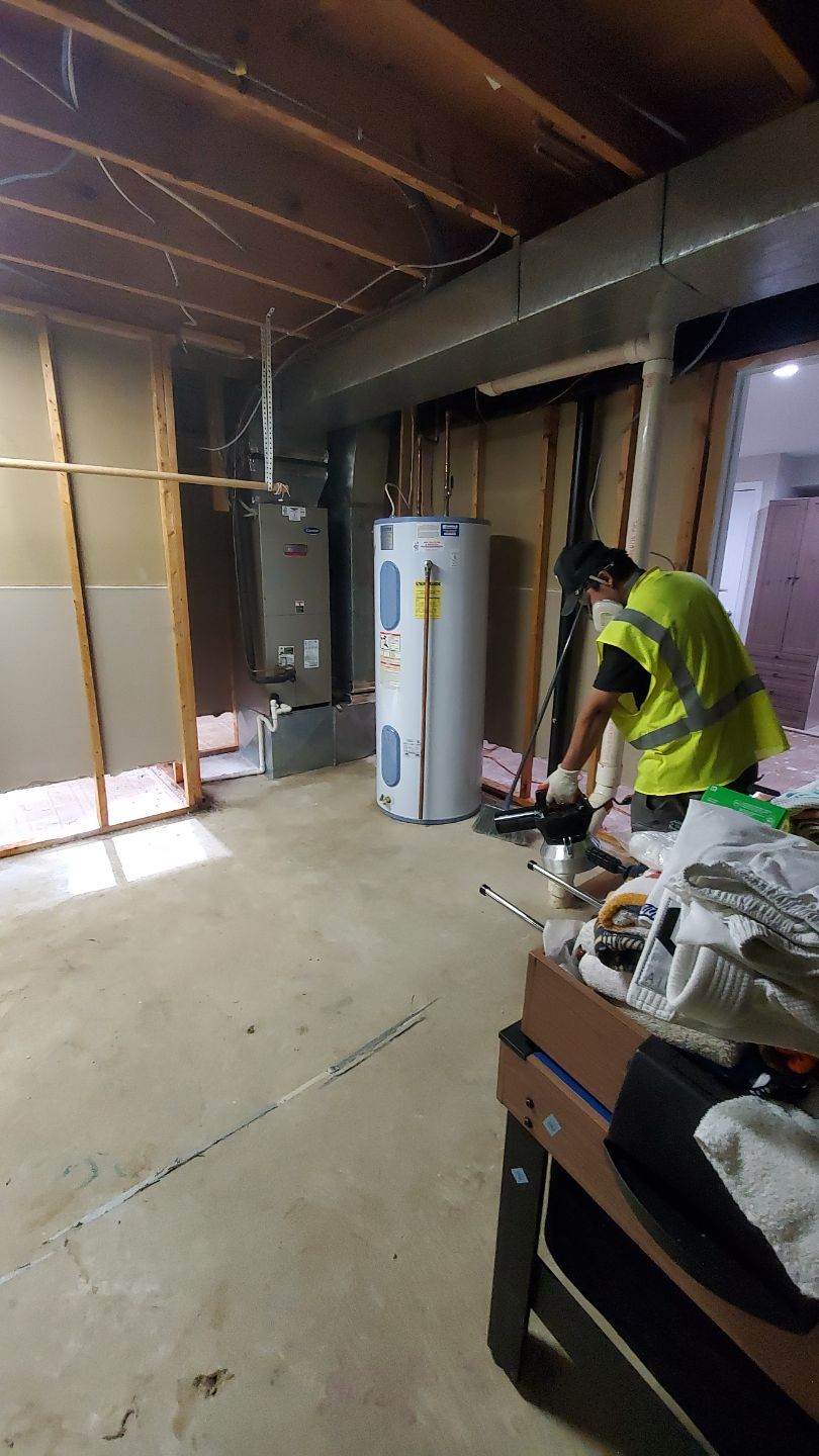 Thermal imaging camera documenting moisture patterns across affected surfaces in Sterling restoration containment.