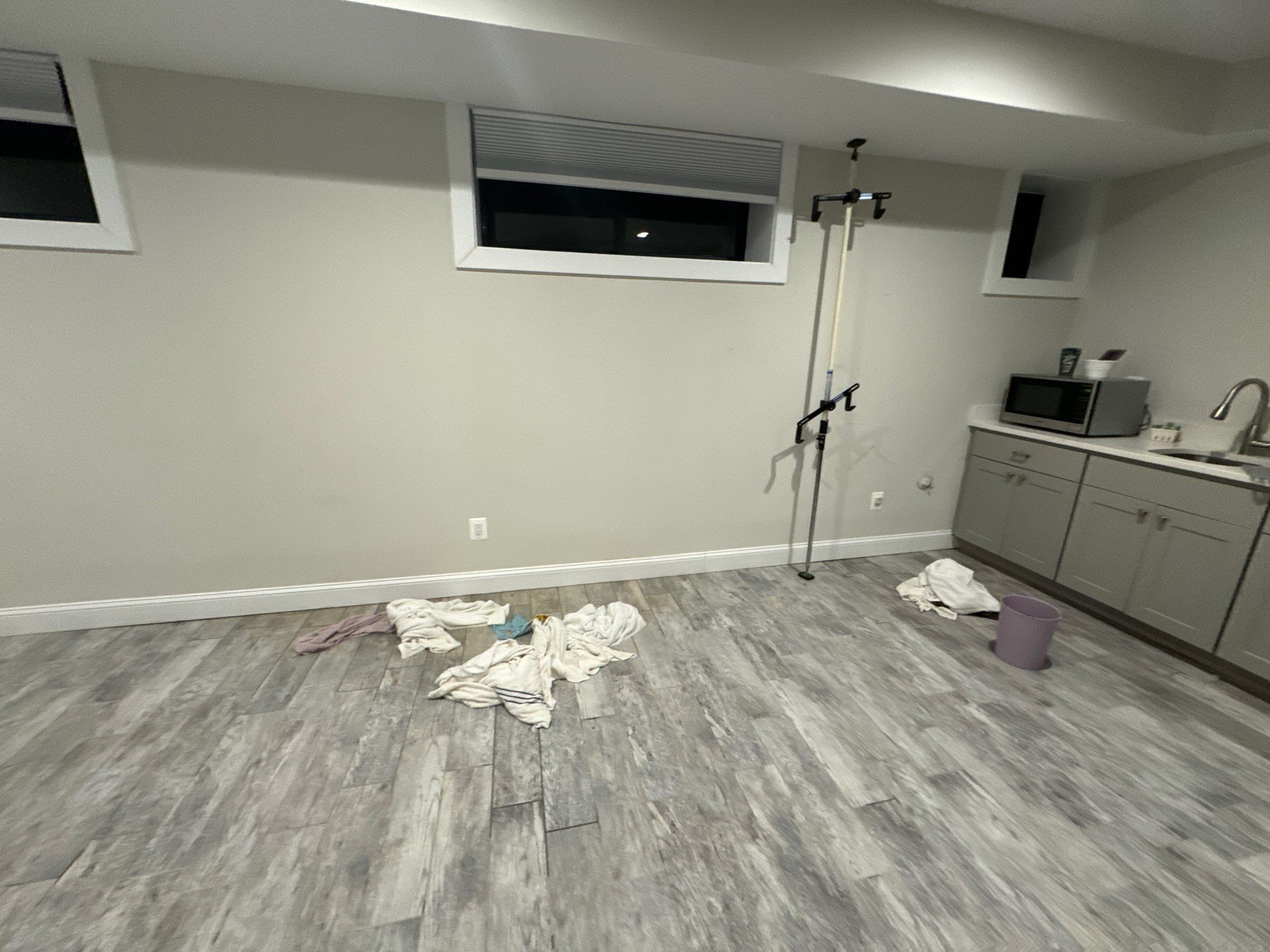 Mid-stage drying setup with continued dehumidification and air circulation in place.